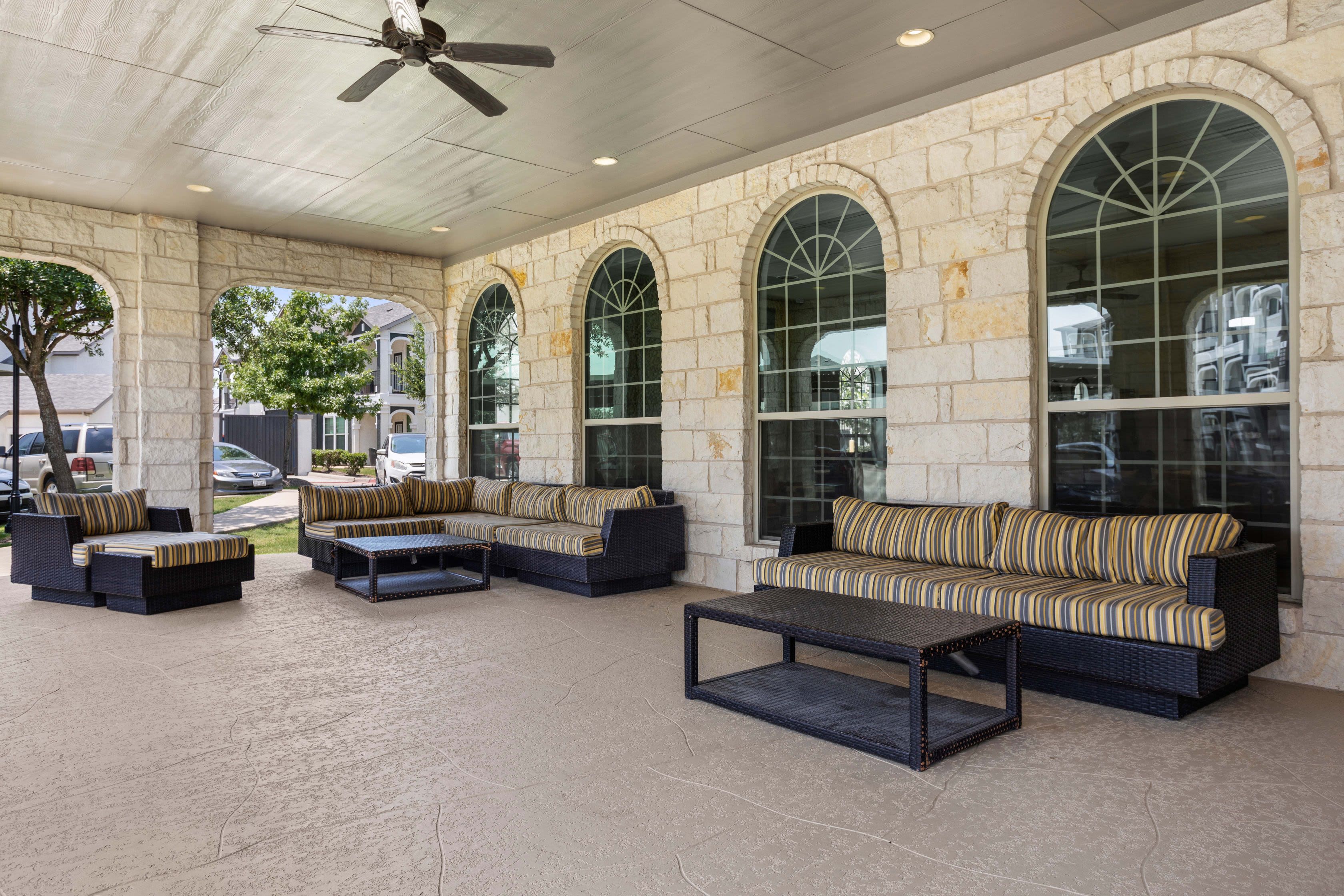 Large covered outdoor lounge at Olympus Woodbridge in Sachse, Texas