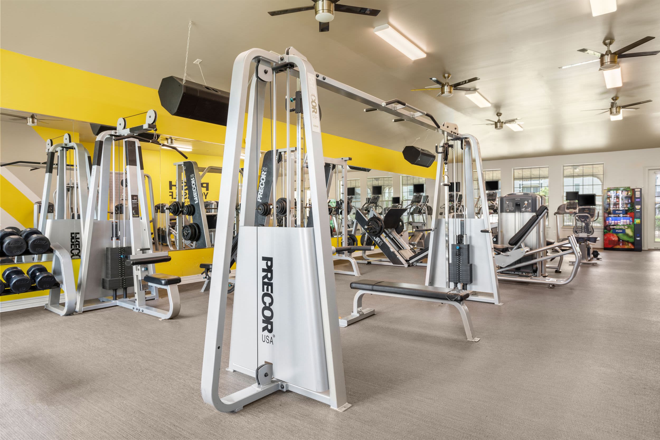 Very well-equipped onsite fitness center at Olympus Woodbridge in Sachse, Texas