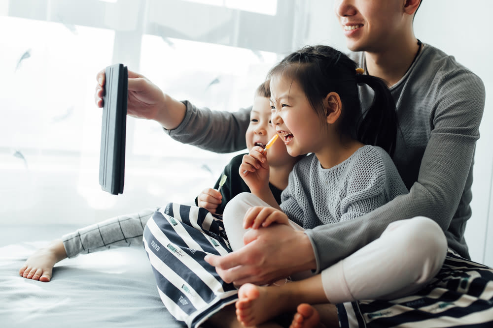 Children laughing at Emmitt Luxury Apartments in Haltom City, Texas