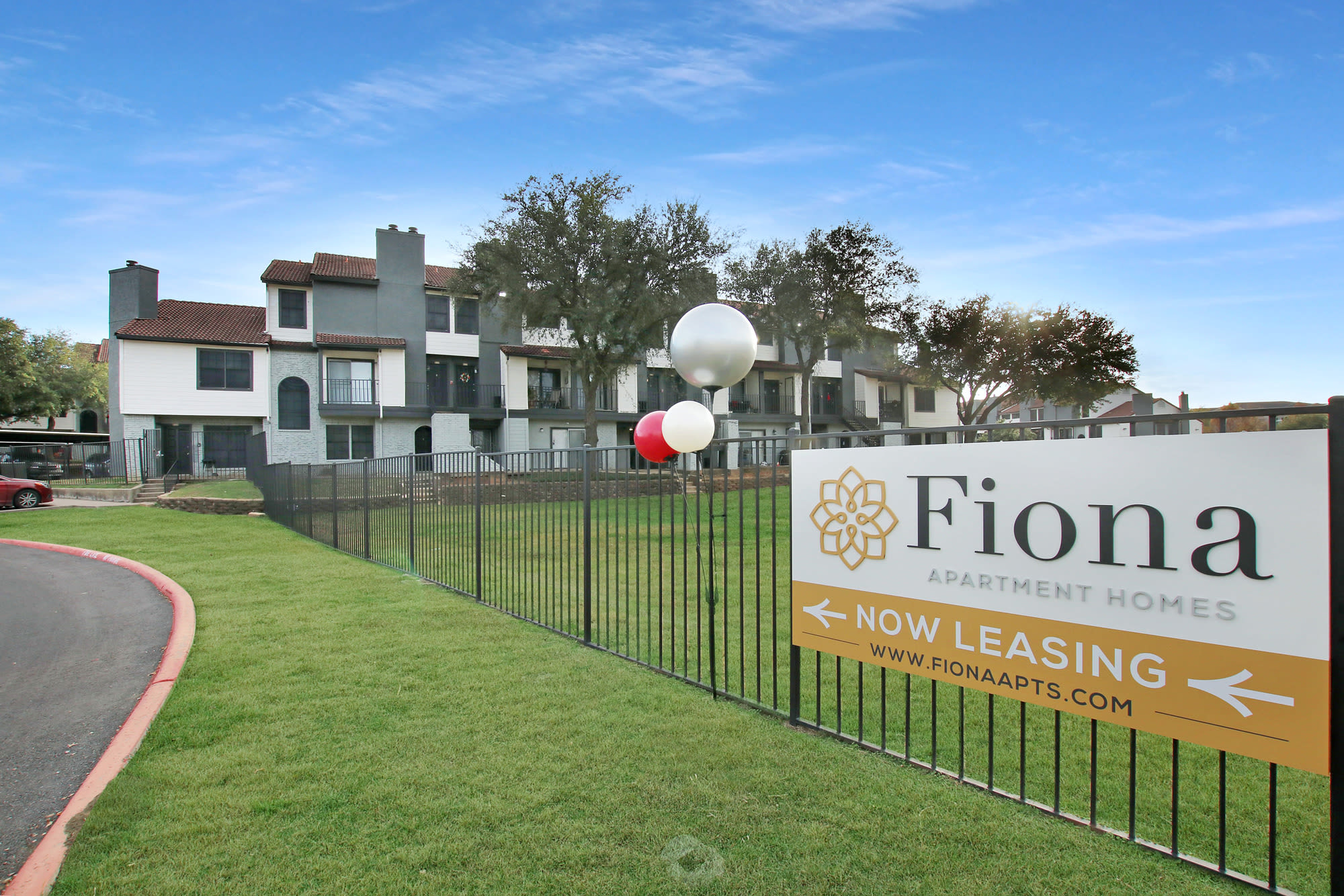 Apartment facade at Fiona Apartment Homes in Irving, Texas