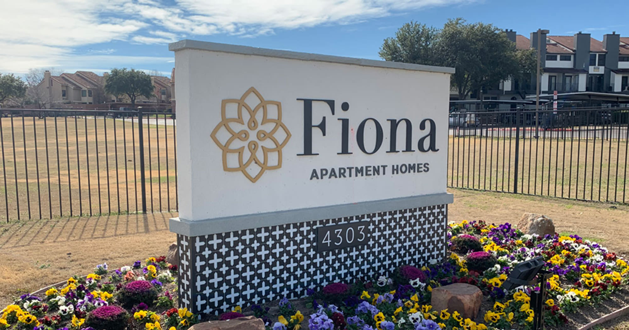 Community entrance at Fiona Apartment Homes in Irving, Texas