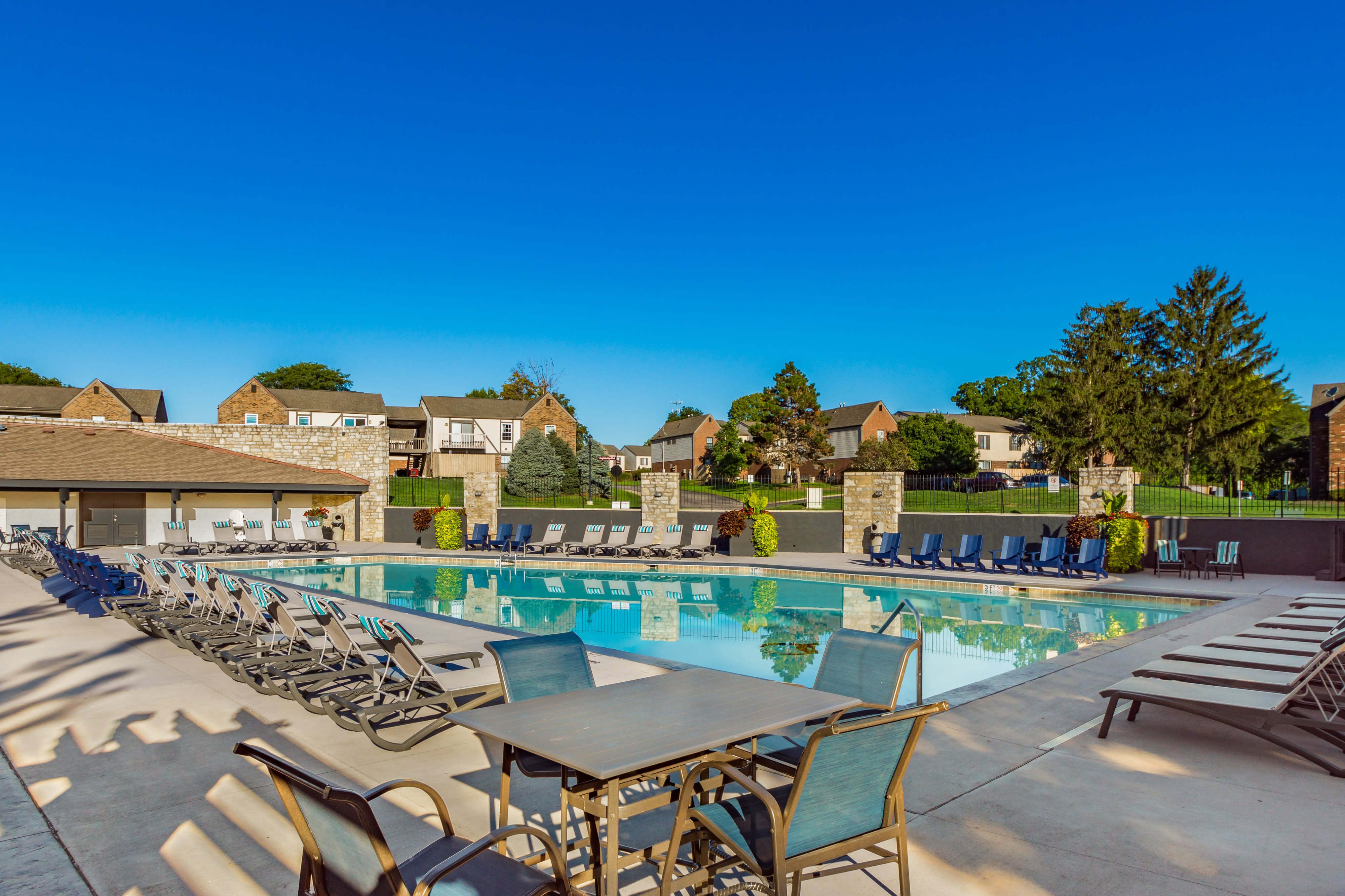 Wonderful pool with lounge chairs at The Commons at Olentangy in Columbus, Ohio