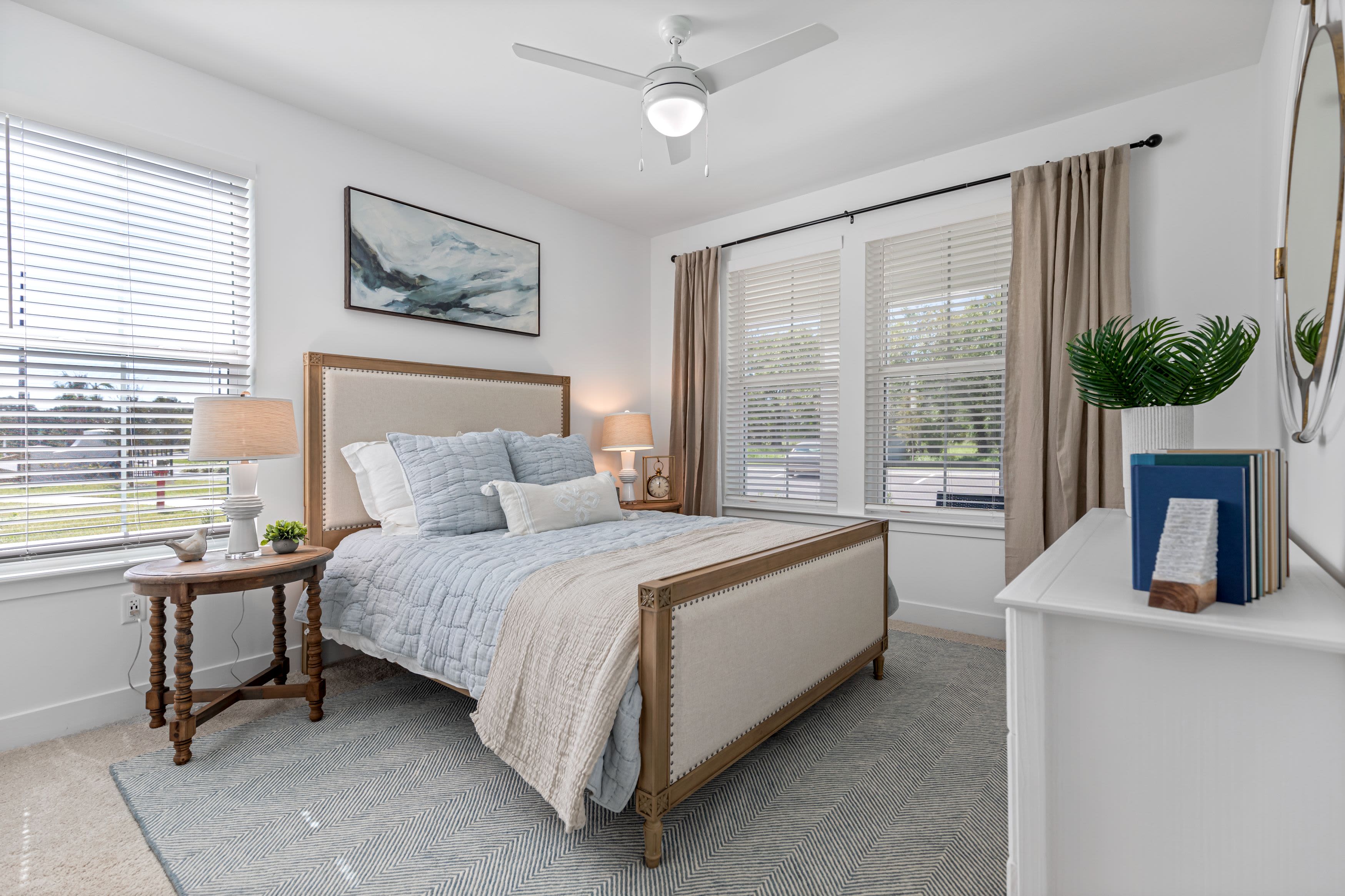 Spacious bedroom in a model apartment at The Griffon Vero Beach in Vero Beach, Florida