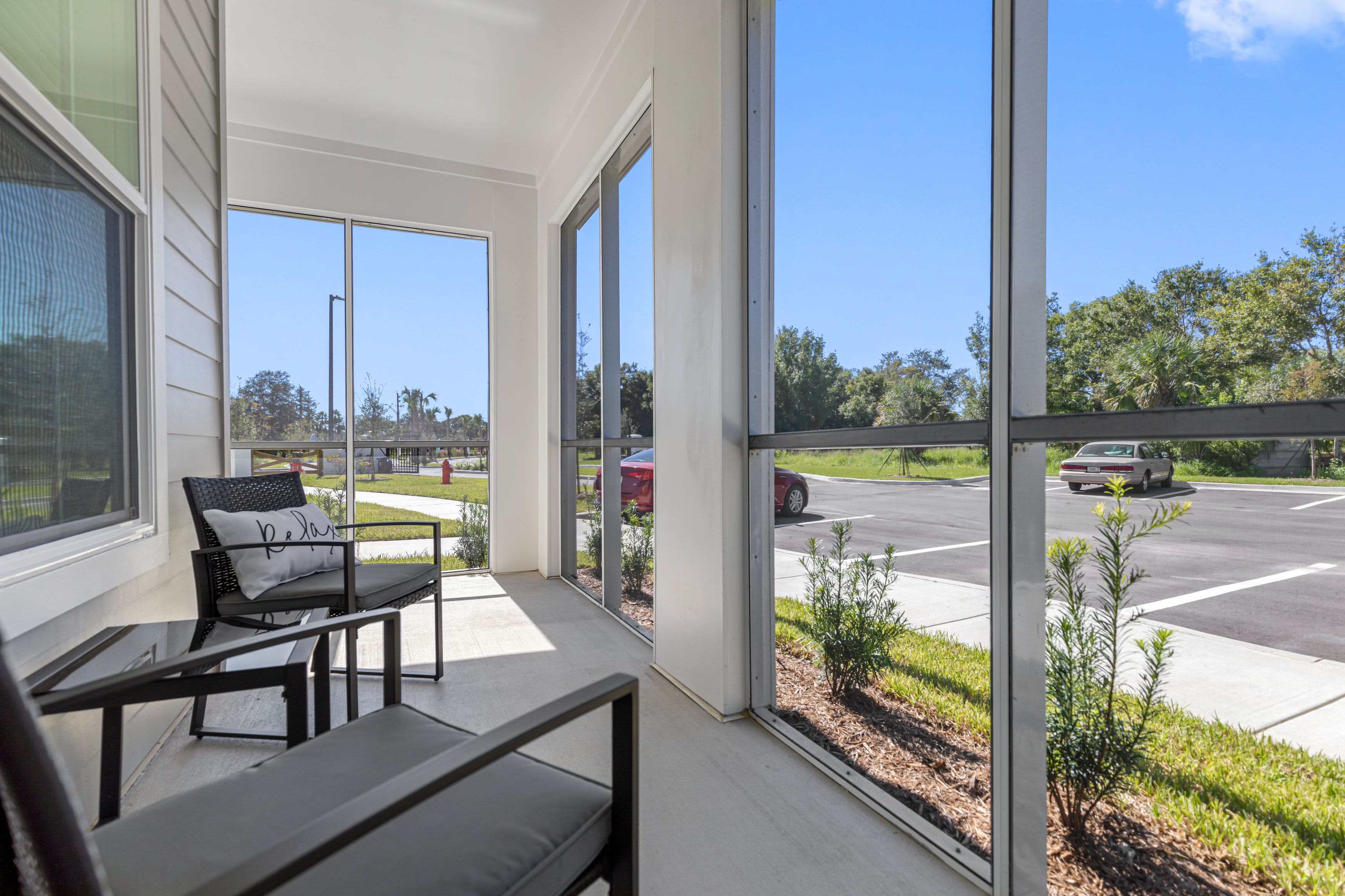 2 chairs on a patio at The Griffon Vero Beach | Apartments in Vero Beach, Florida