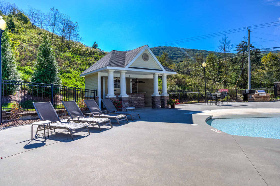 Swimming pool with lounge chairs at Berrington Village in Asheville, North Carolina