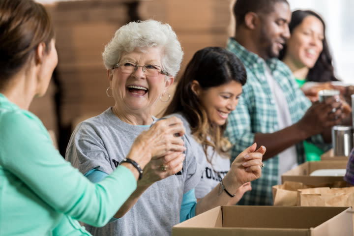 Residents volunteering together at Vista Prairie at Copperleaf in Willmar, Minnesota