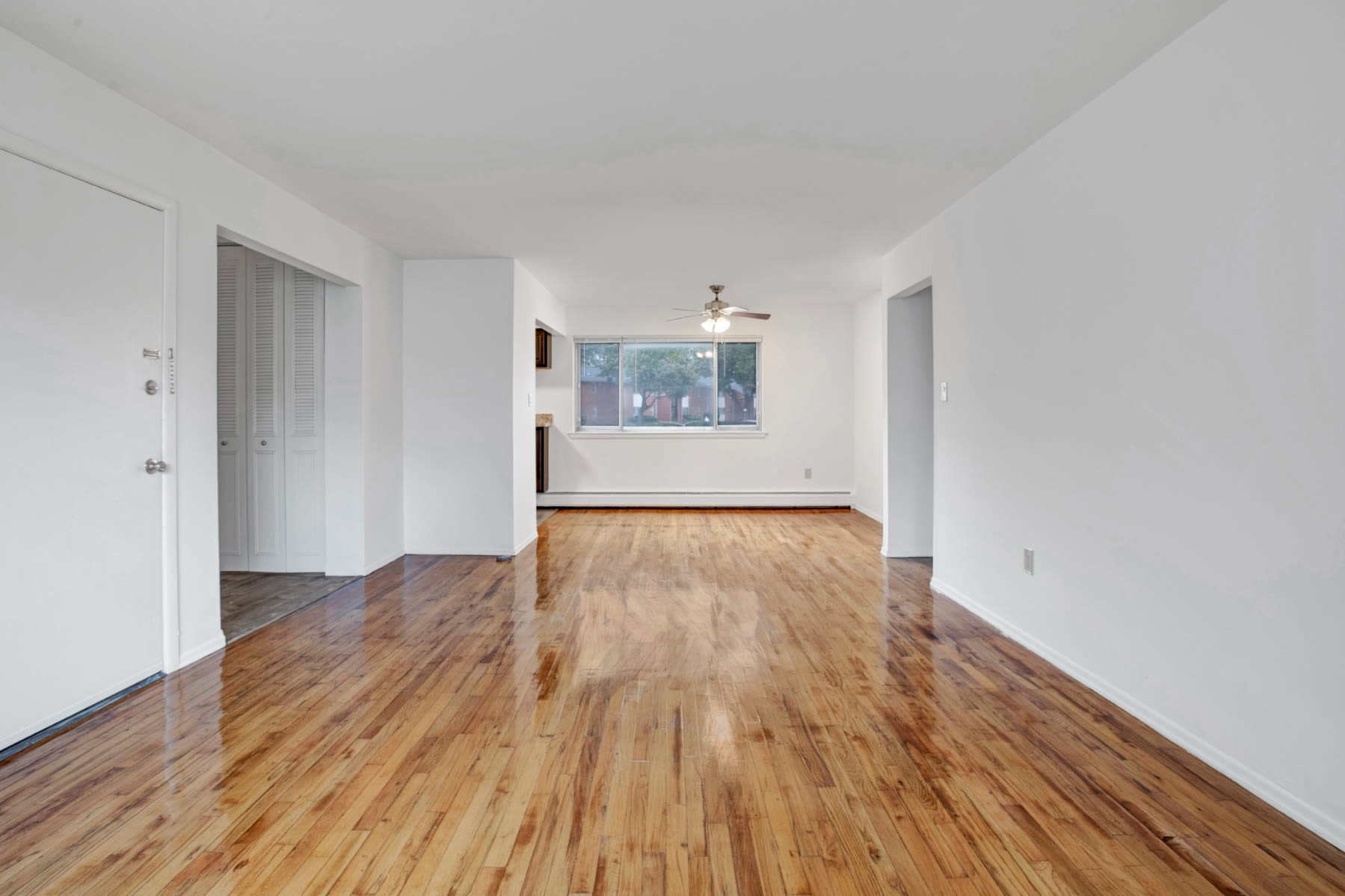Hardwood flooring with window later in the day at Laurel Run Village in Bordentown, New Jersey