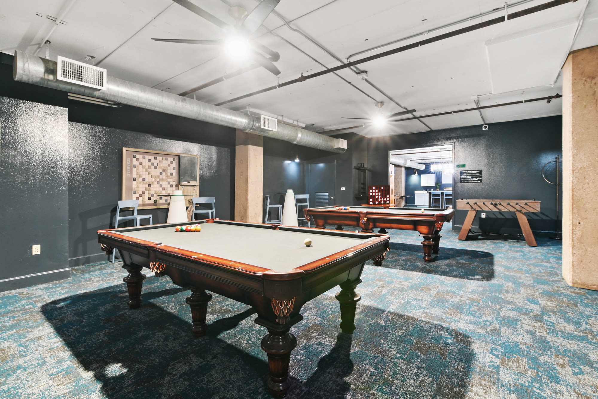Clubhouse with pool tables at South Side on Lamar in Dallas, Texas