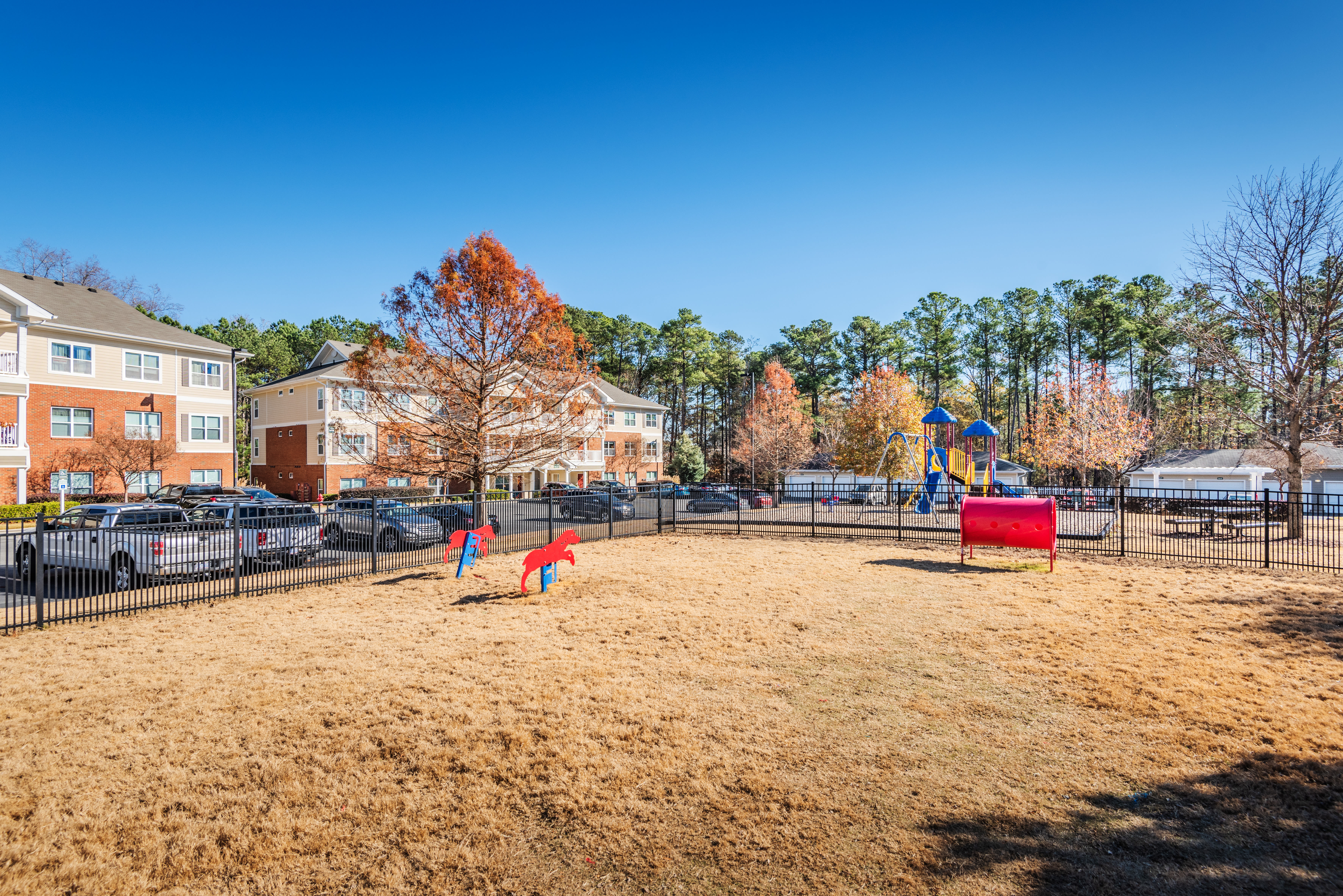 A gated dog park at Village at Broadstone Station in Apex, North Carolina