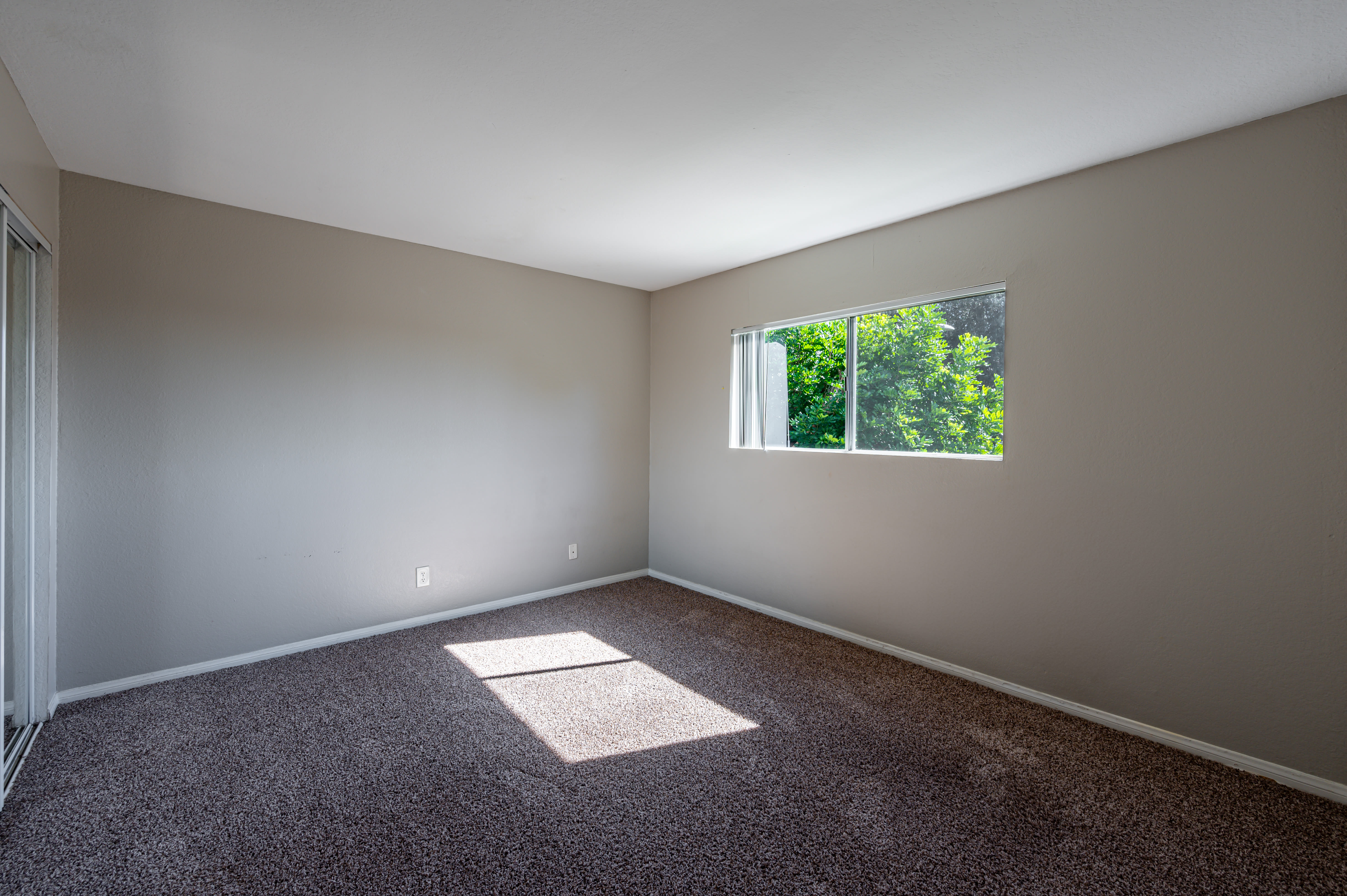 Spacious bedroom with windows at Legacy at Westglen in Glendale, California, 