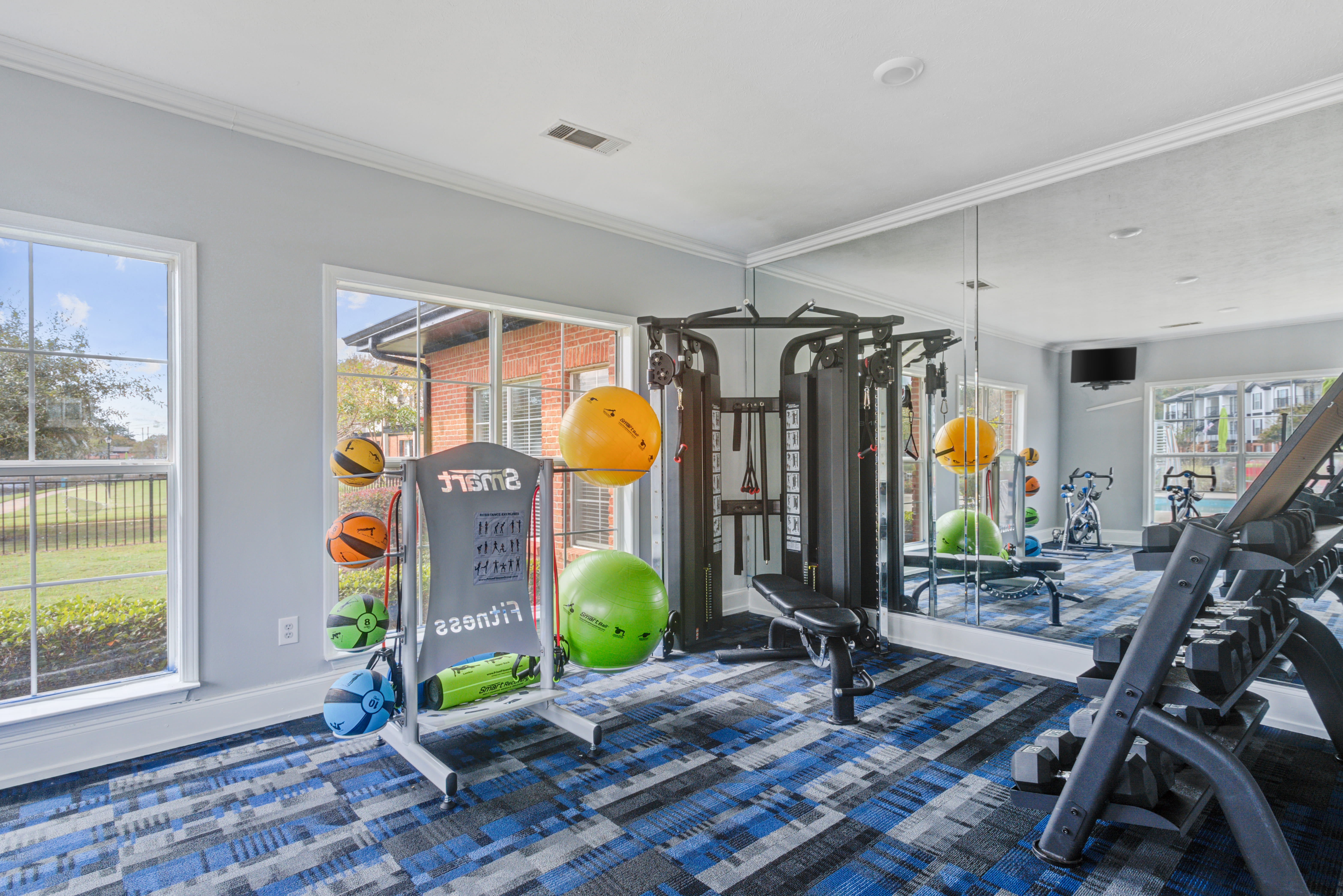Cardio and weight machines in the fitness center at Windsor Lake in Brandon, Mississippi