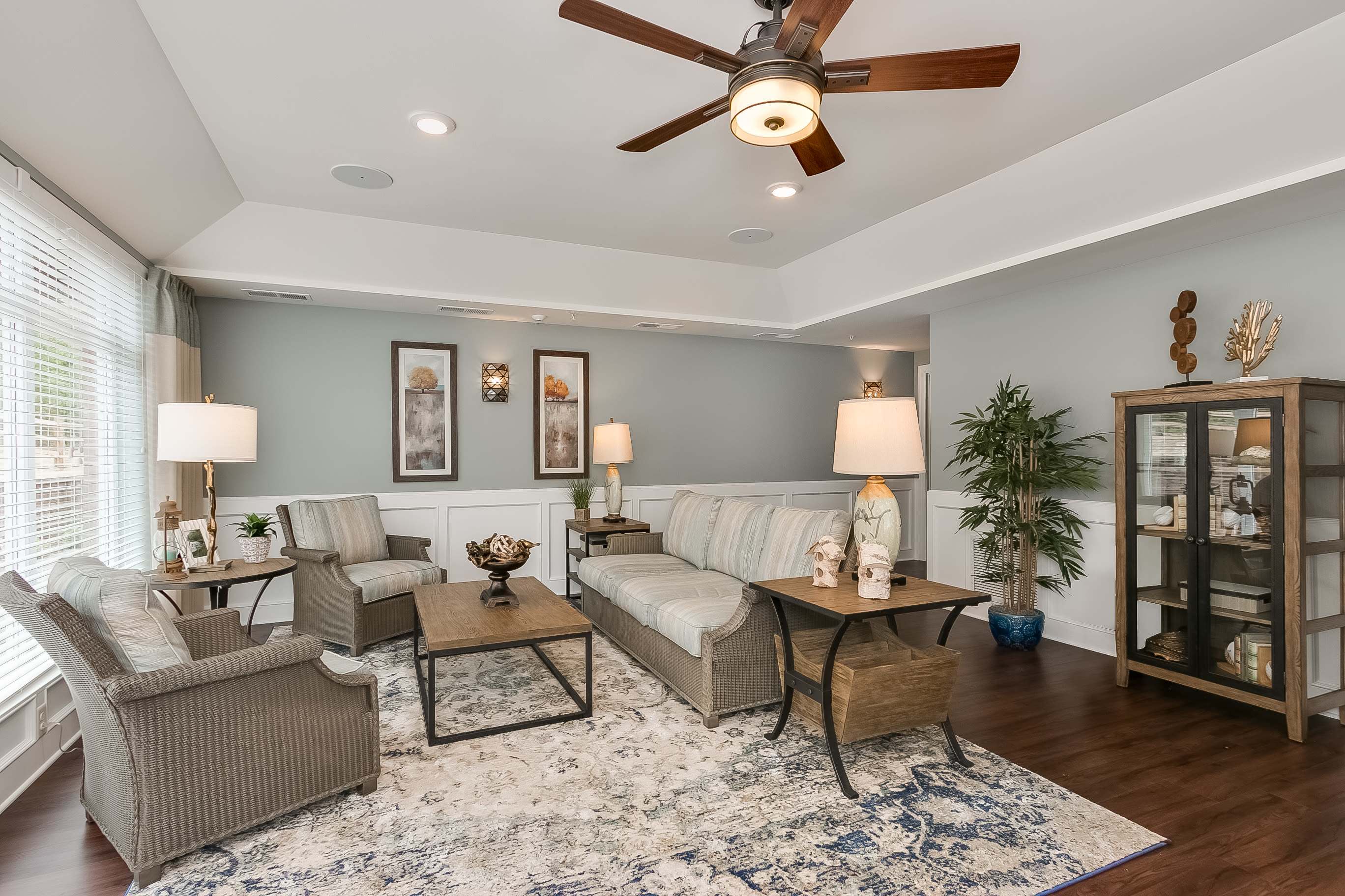 Living space with a ceiling fan at Amira in Bloomington, Minnesota