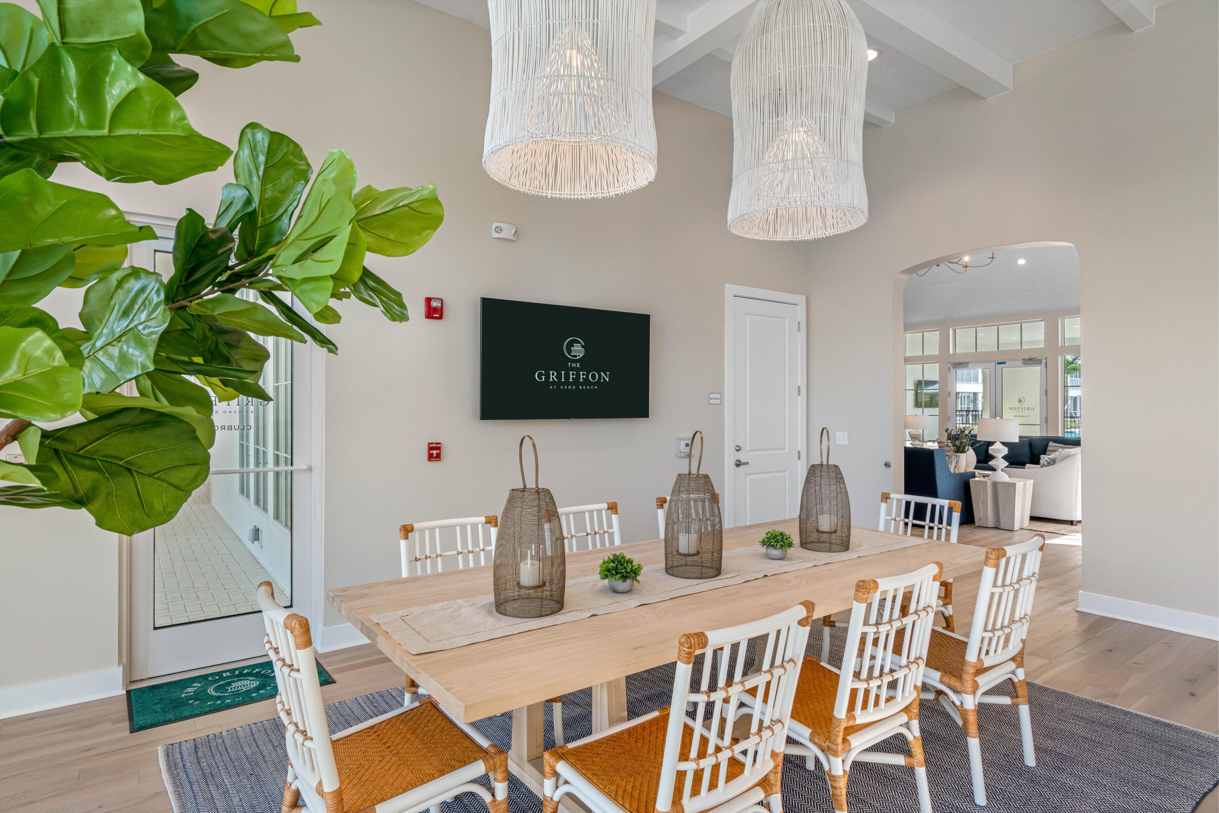 Large table with ample seating in the clubhouse at The Griffon Vero Beach in Vero Beach, Florida 