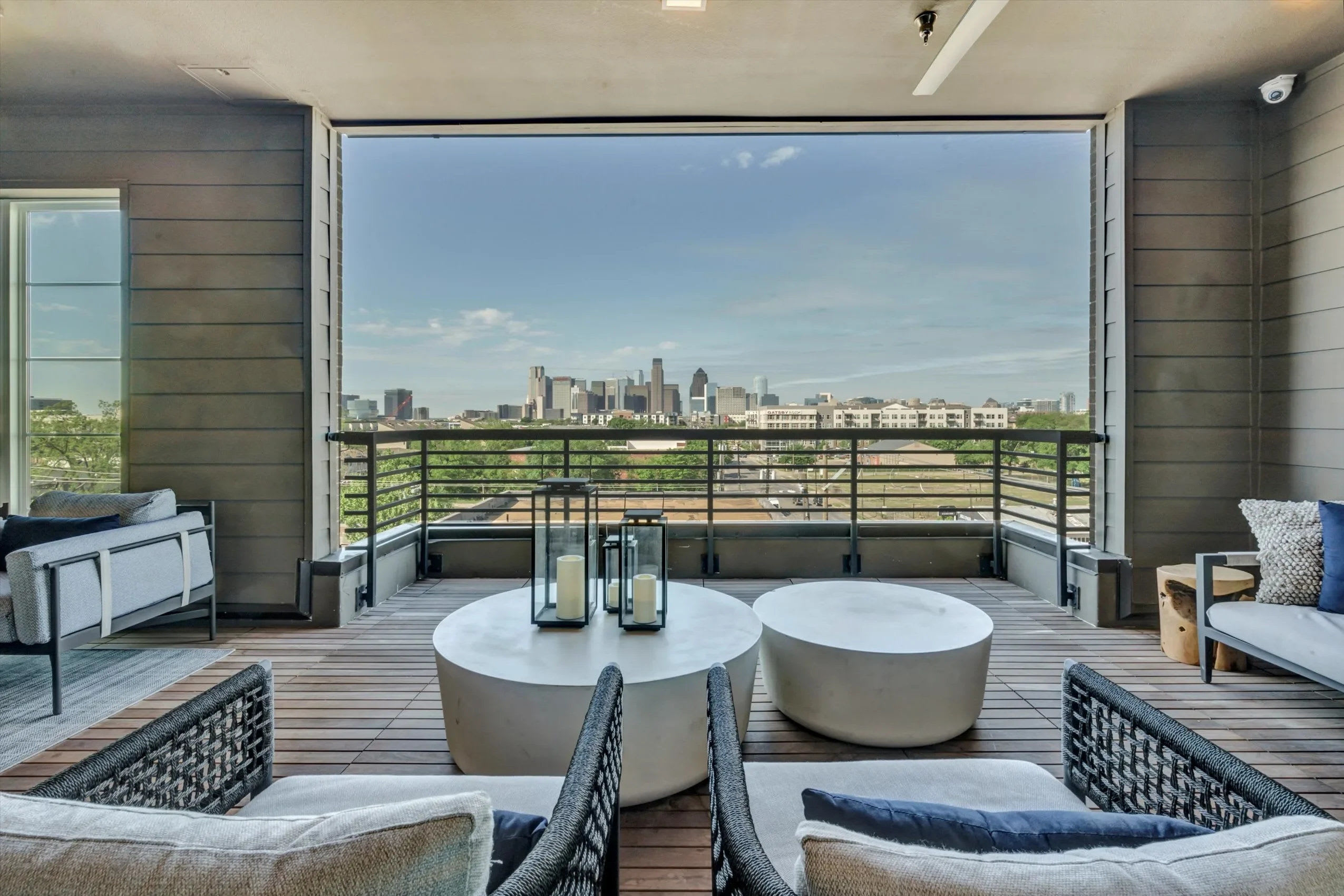 Views of the city from the rooftop lounge area at Ross + Peak in Dallas, Texas
