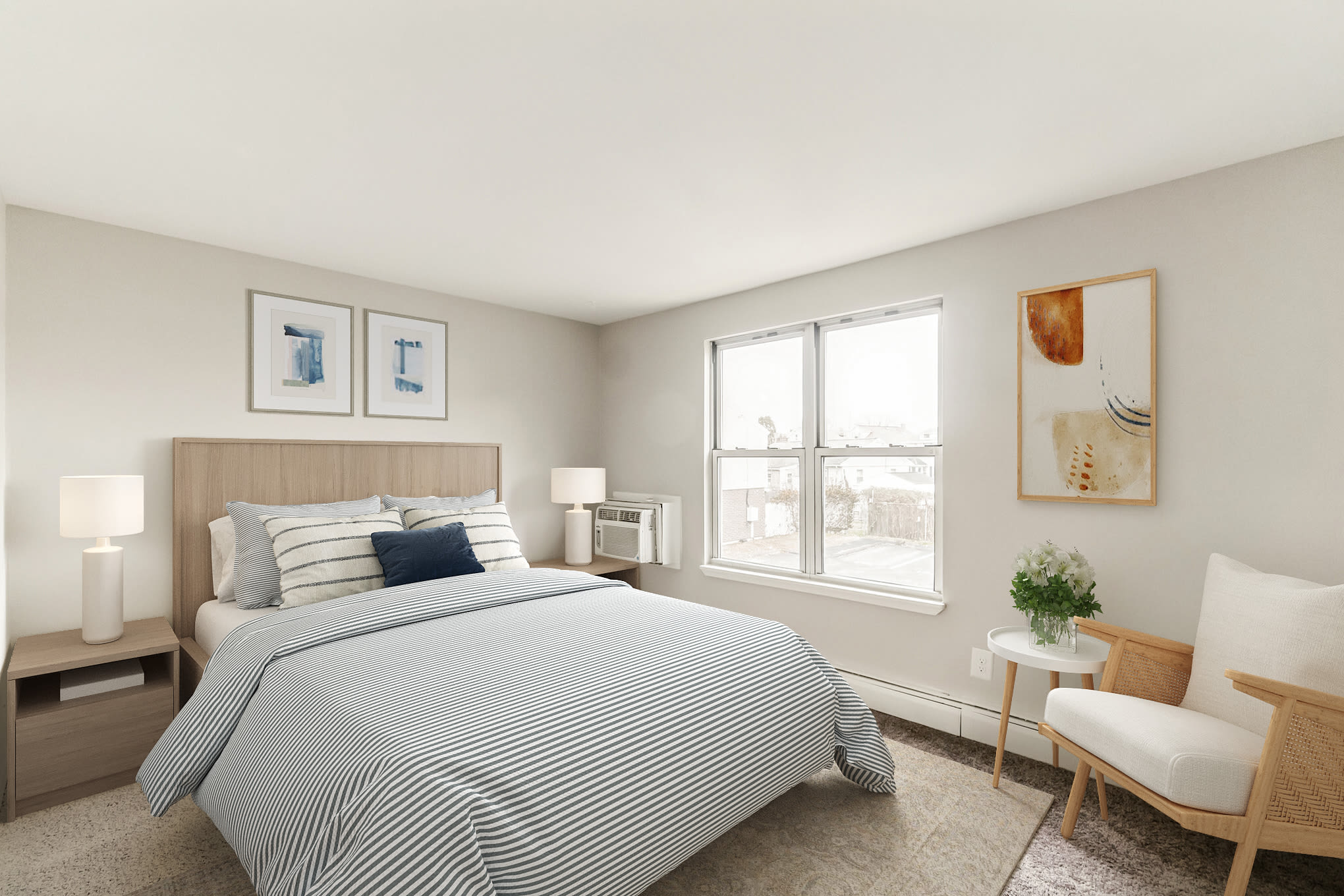 Bedroom with modern touches at Eagle Rock Apartments & Townhomes at Brighton in Brighton, Massachusetts
