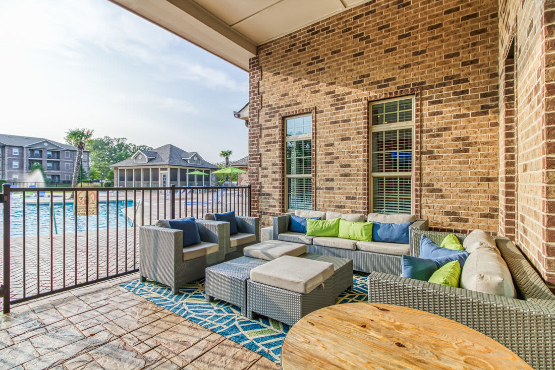 Swimming pool and patio with couches and table for lounging Everwood at The Avenue in Murfreesboro, Tennessee