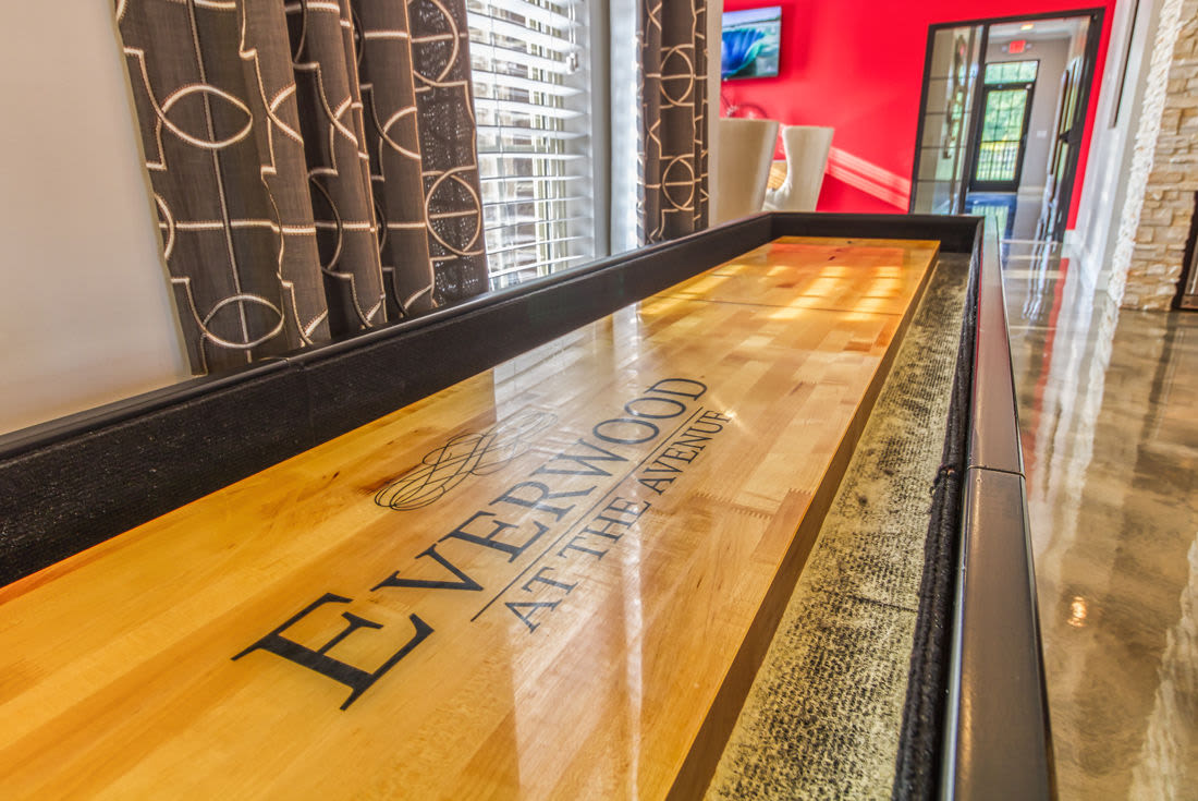 Game room with a shuffleboard at Everwood at The Avenue in Murfreesboro, Tennessee