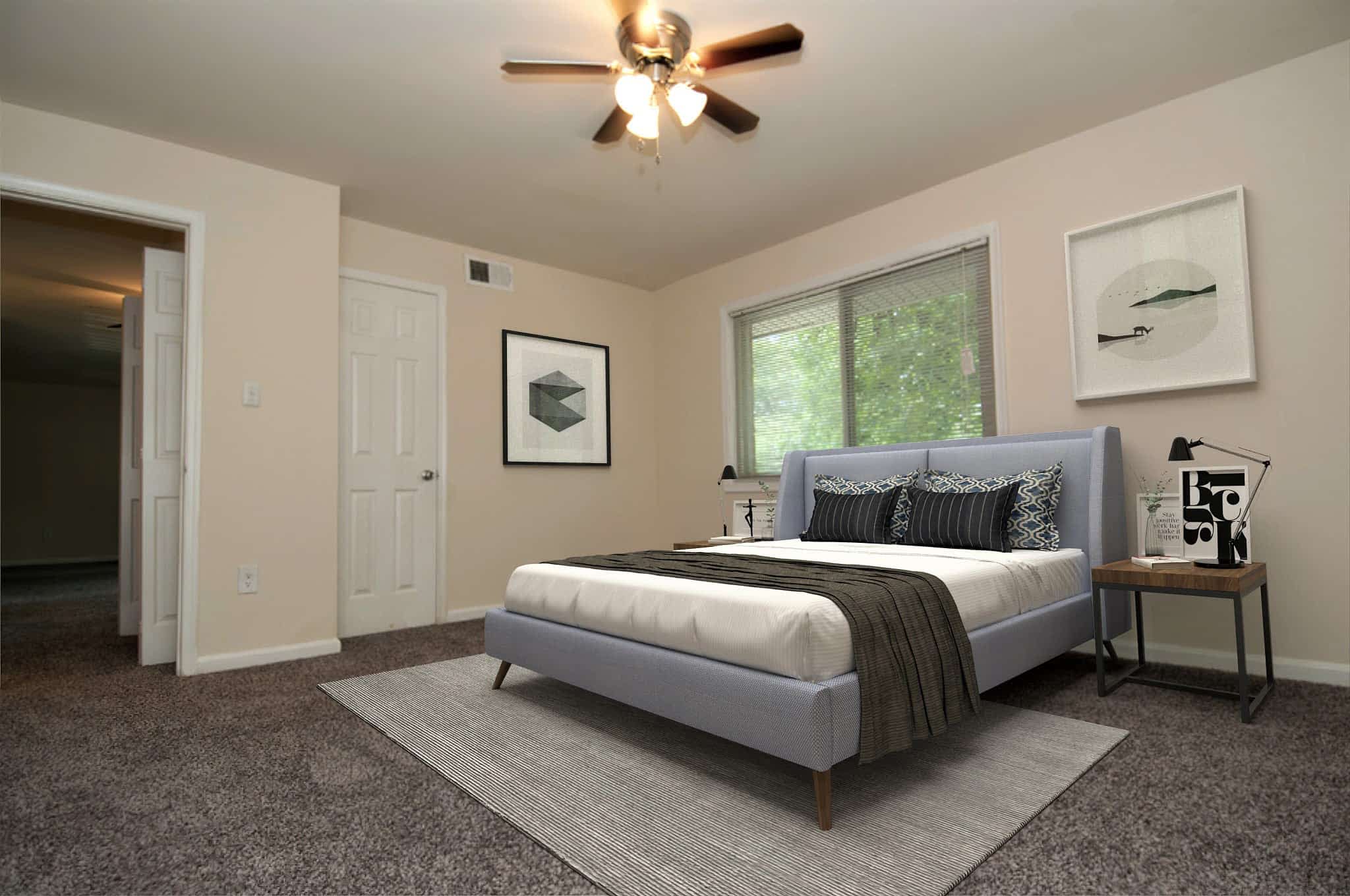 Model bedroom with soft carpet at Fox Rest in Laurel, Maryland