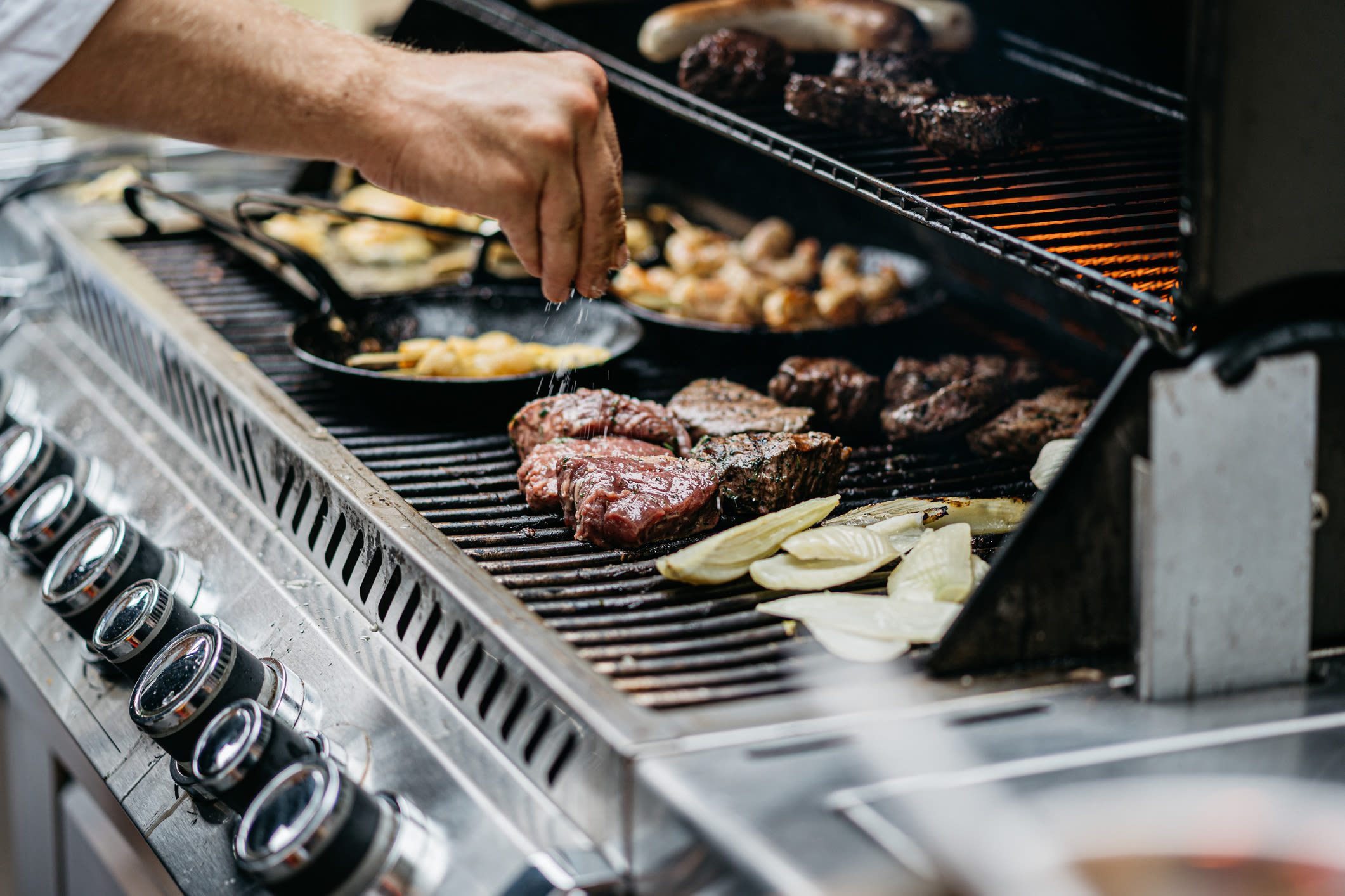 Barbequing stations at The Elms at Arcola in Dulles, Virginia