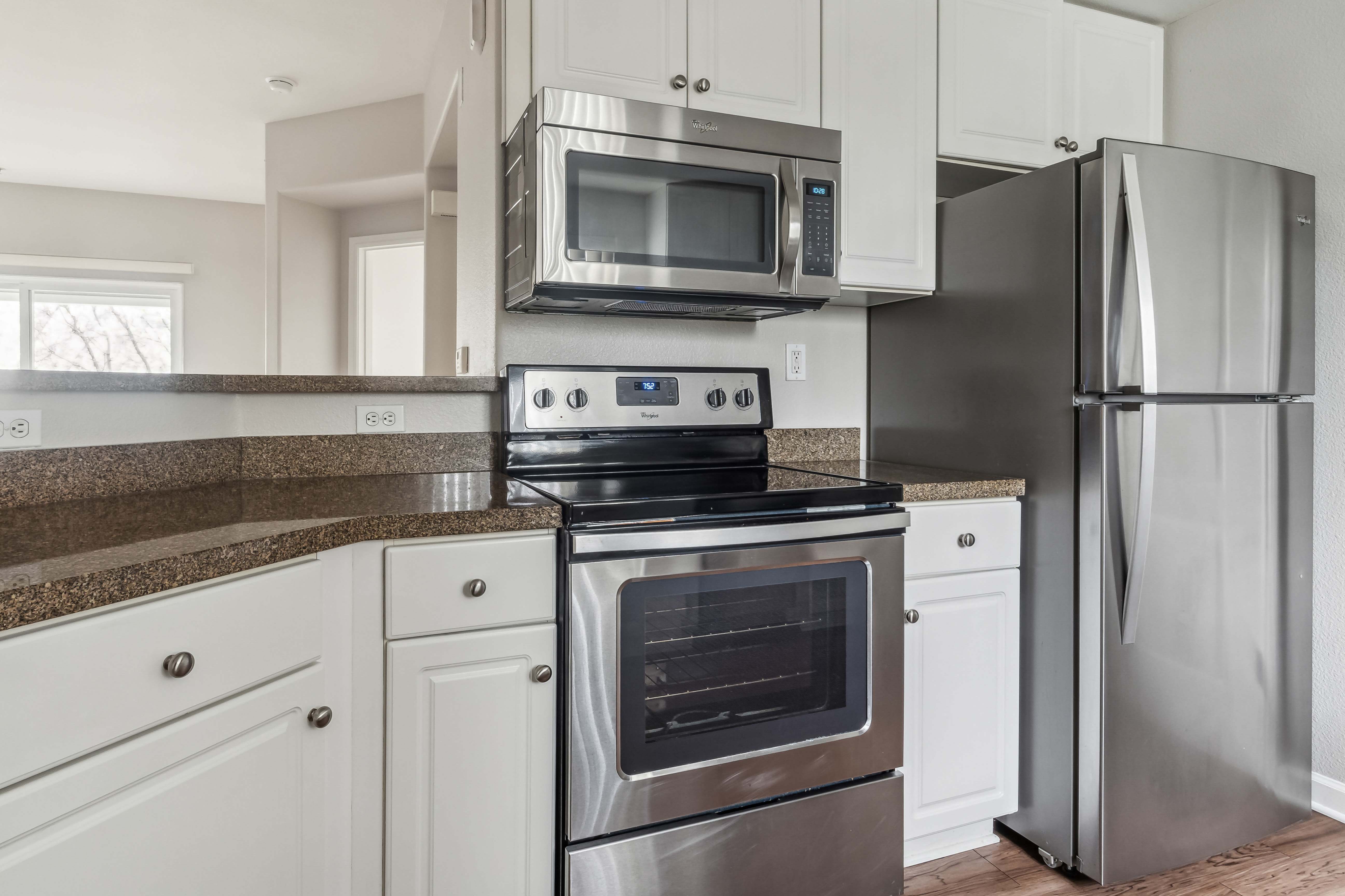 kitchen with stainless steel appliances at The Kensington in Pleasanton, California