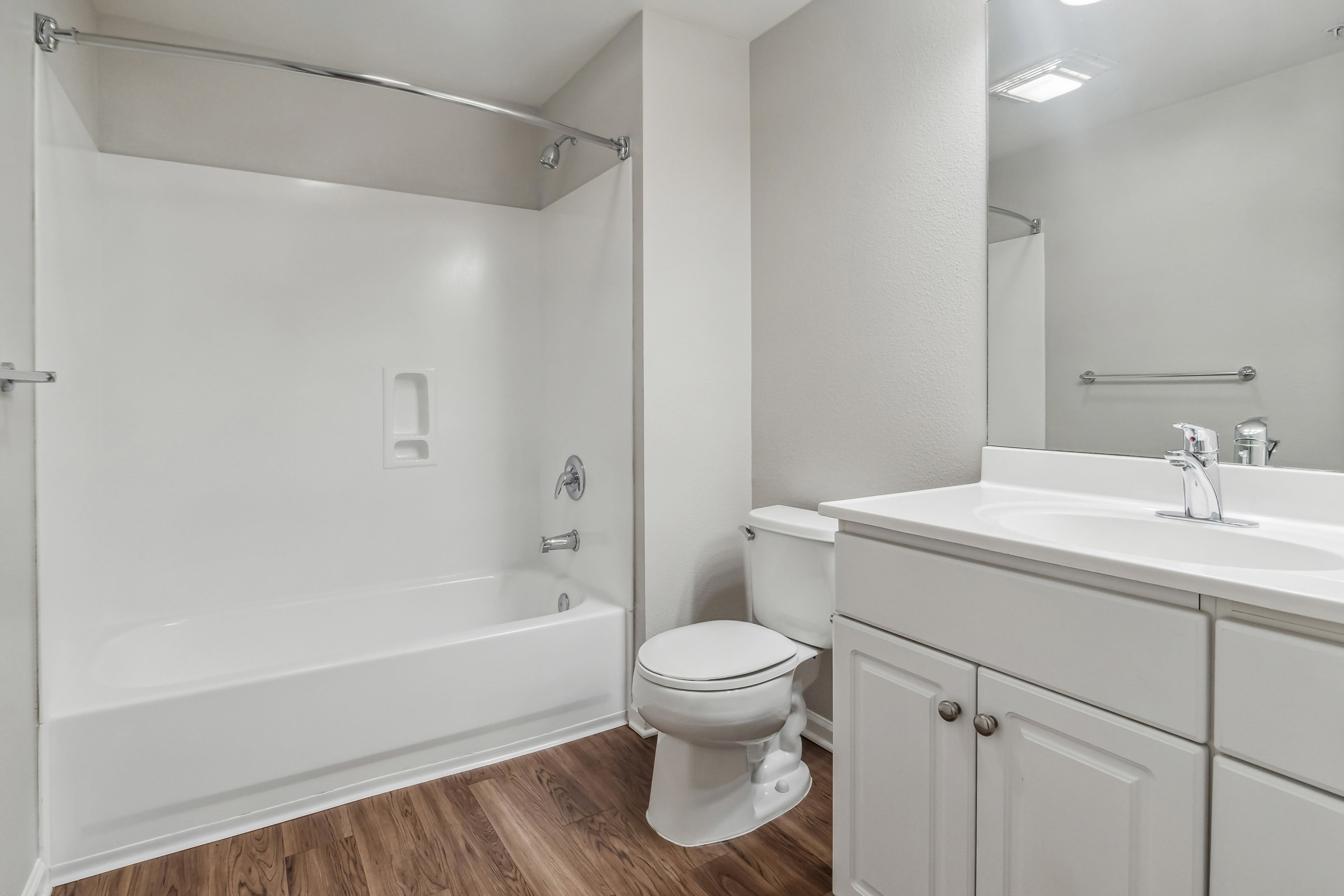 bathroom with white cabinets at The Kensington in Pleasanton, California
