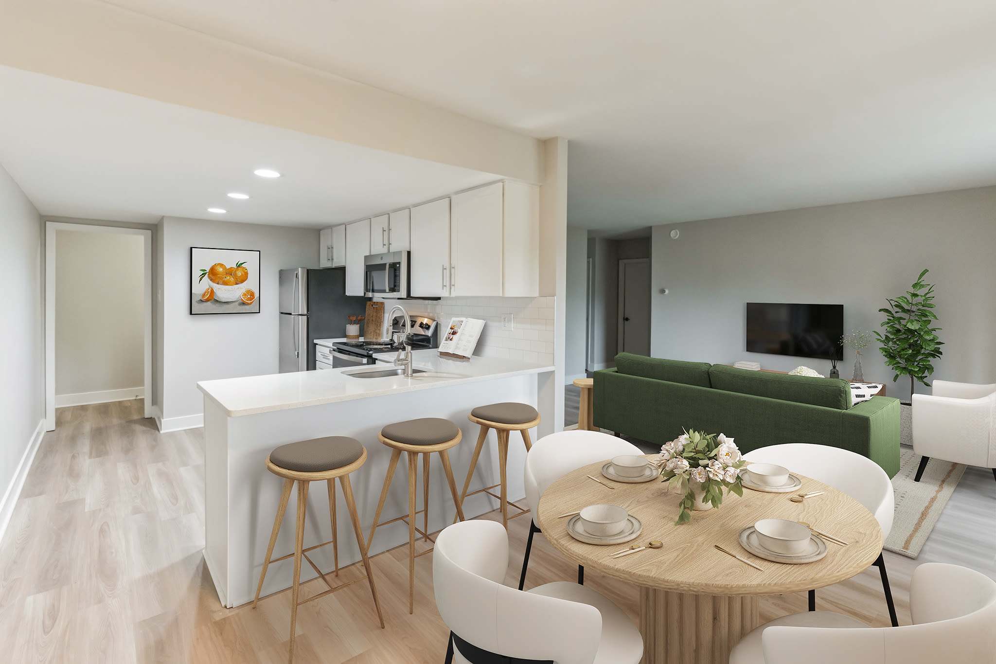 Enjoy Apartments with a Living Room showcasing the Kitchen Area at Eagle Rock Apartments at Malvern in Malvern, Pennsylvania