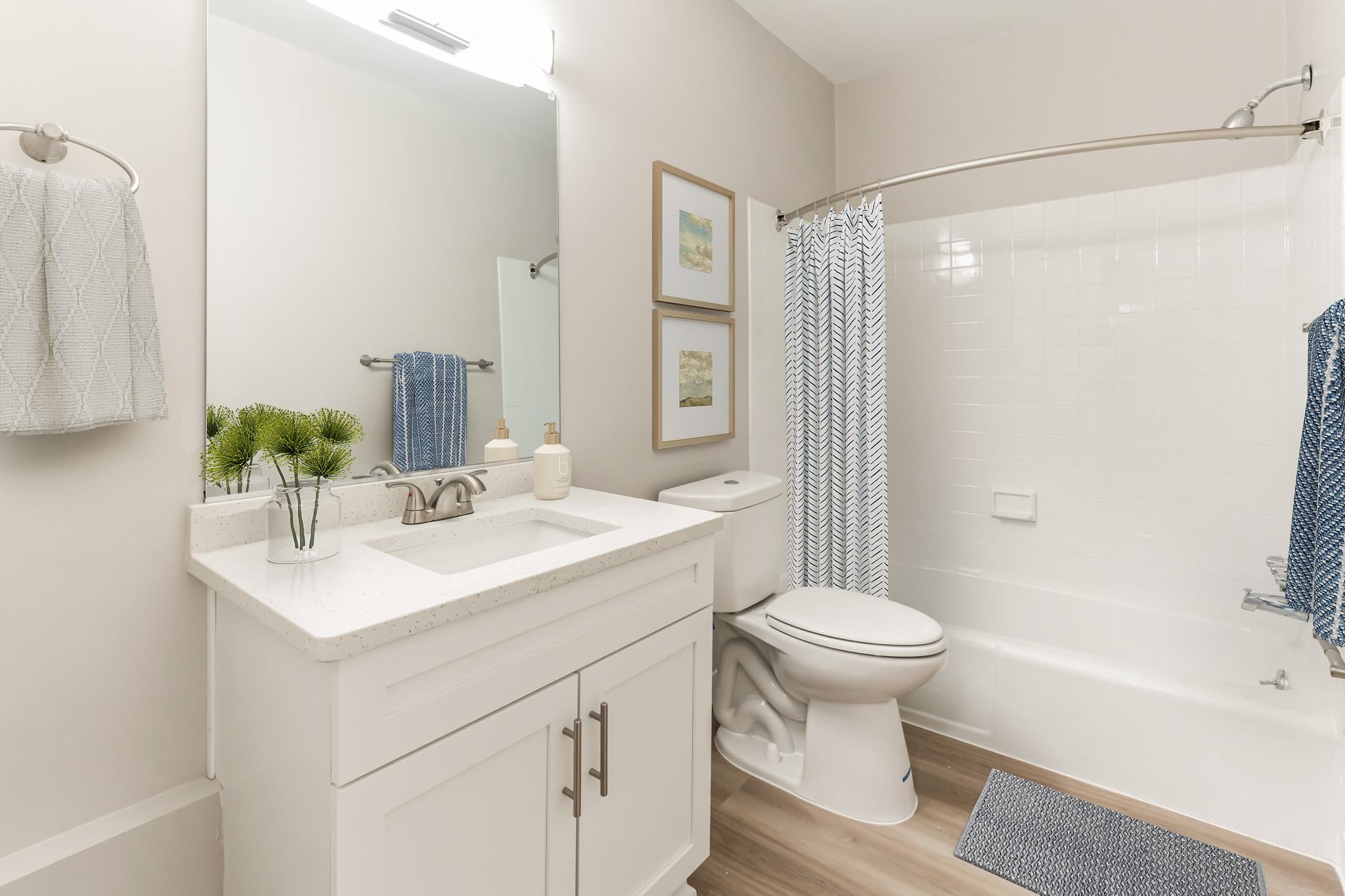 Spacious Bathroom with blue accent linens at Eagle Rock Apartments at Malvern in Malvern, Pennsylvania 
