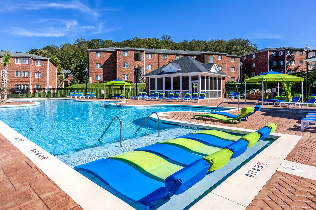Lounge chairs on pool deck at Ascot Point Village in Asheville, North Carolina