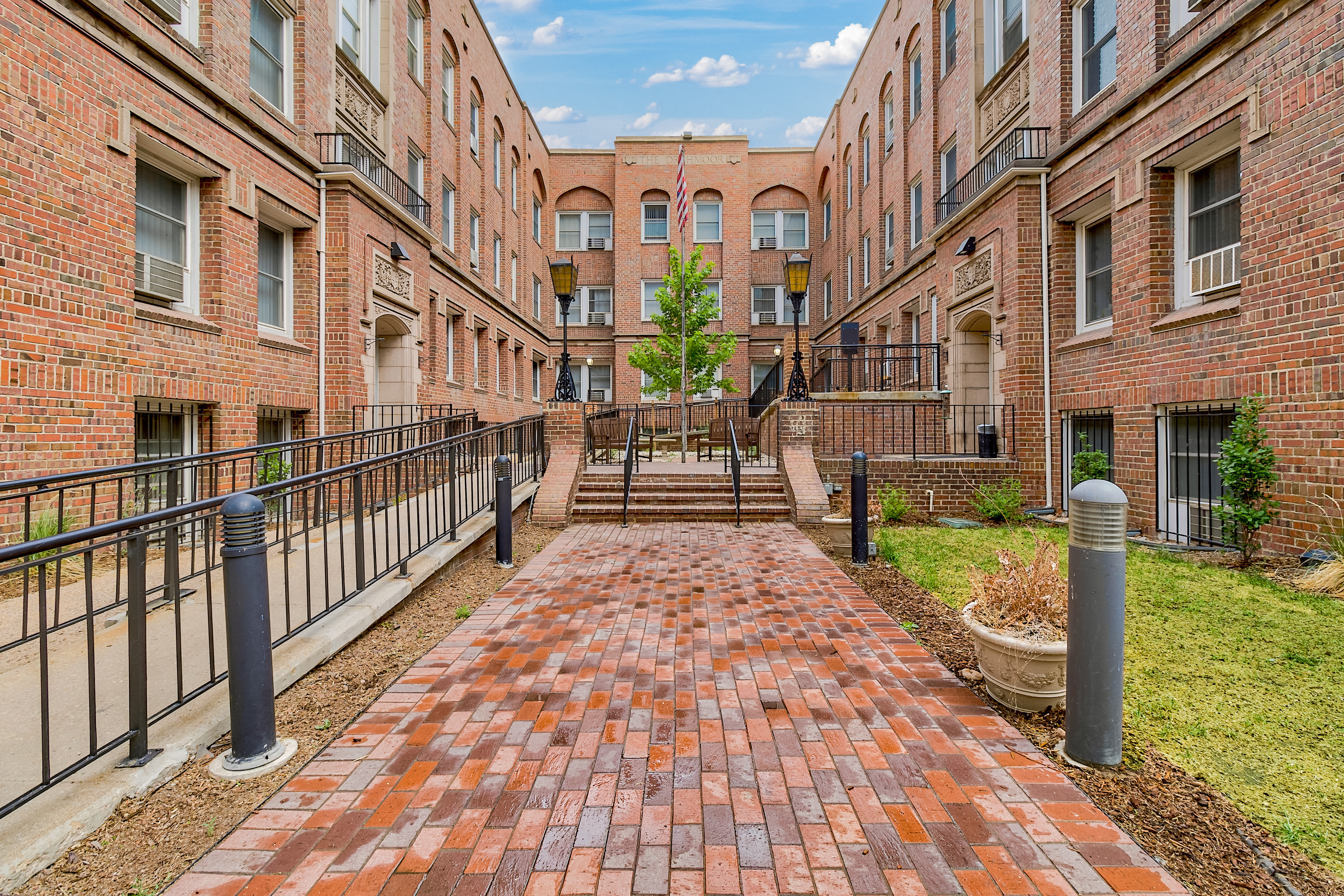 Courtyard and building exterior at Drehmoor Apartments in Denver, Colorado