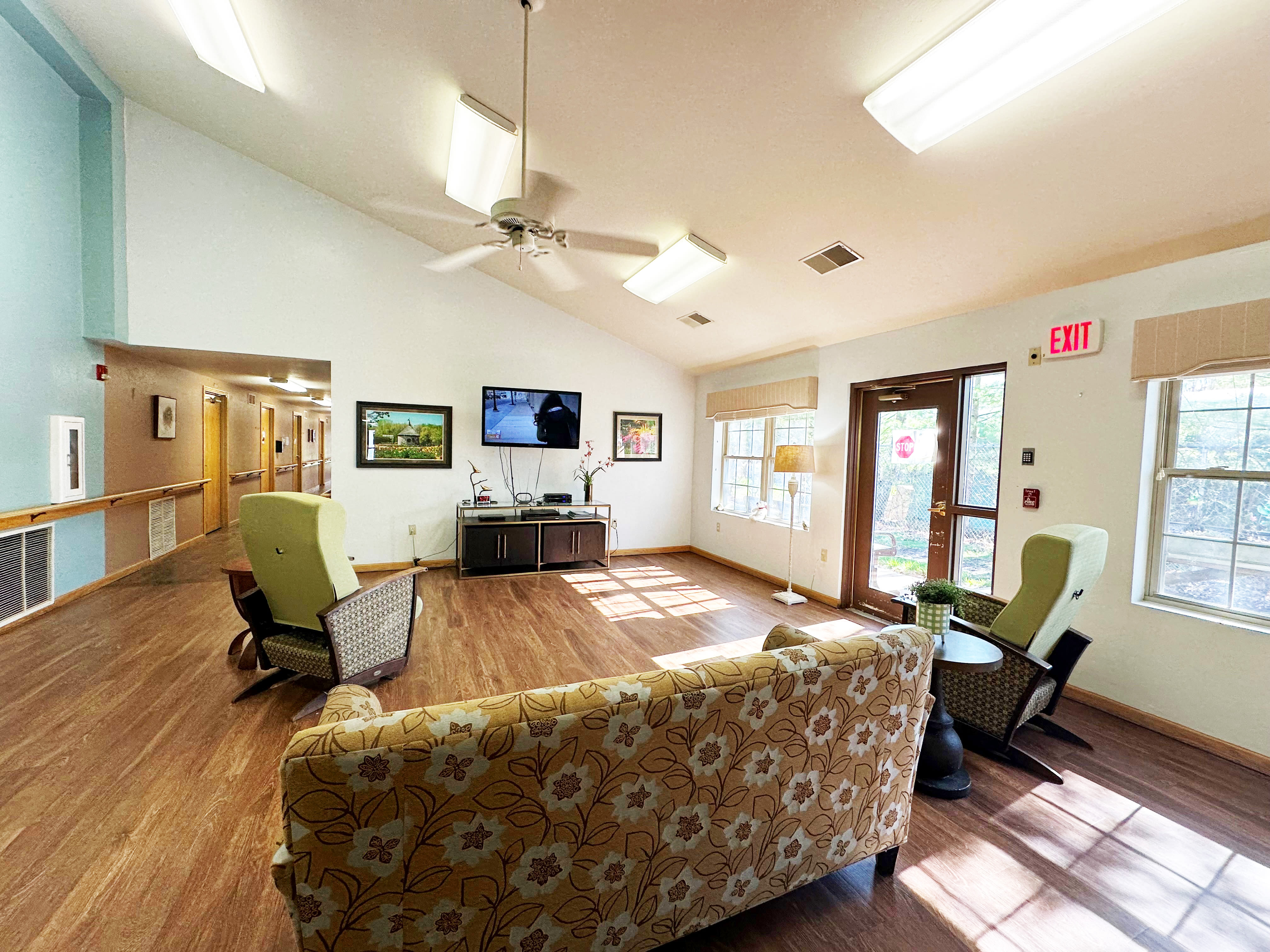 Enjoy our Modern Apartments Living Room  at Wyndemere Memory Care in Green Bay, Wisconsin. 