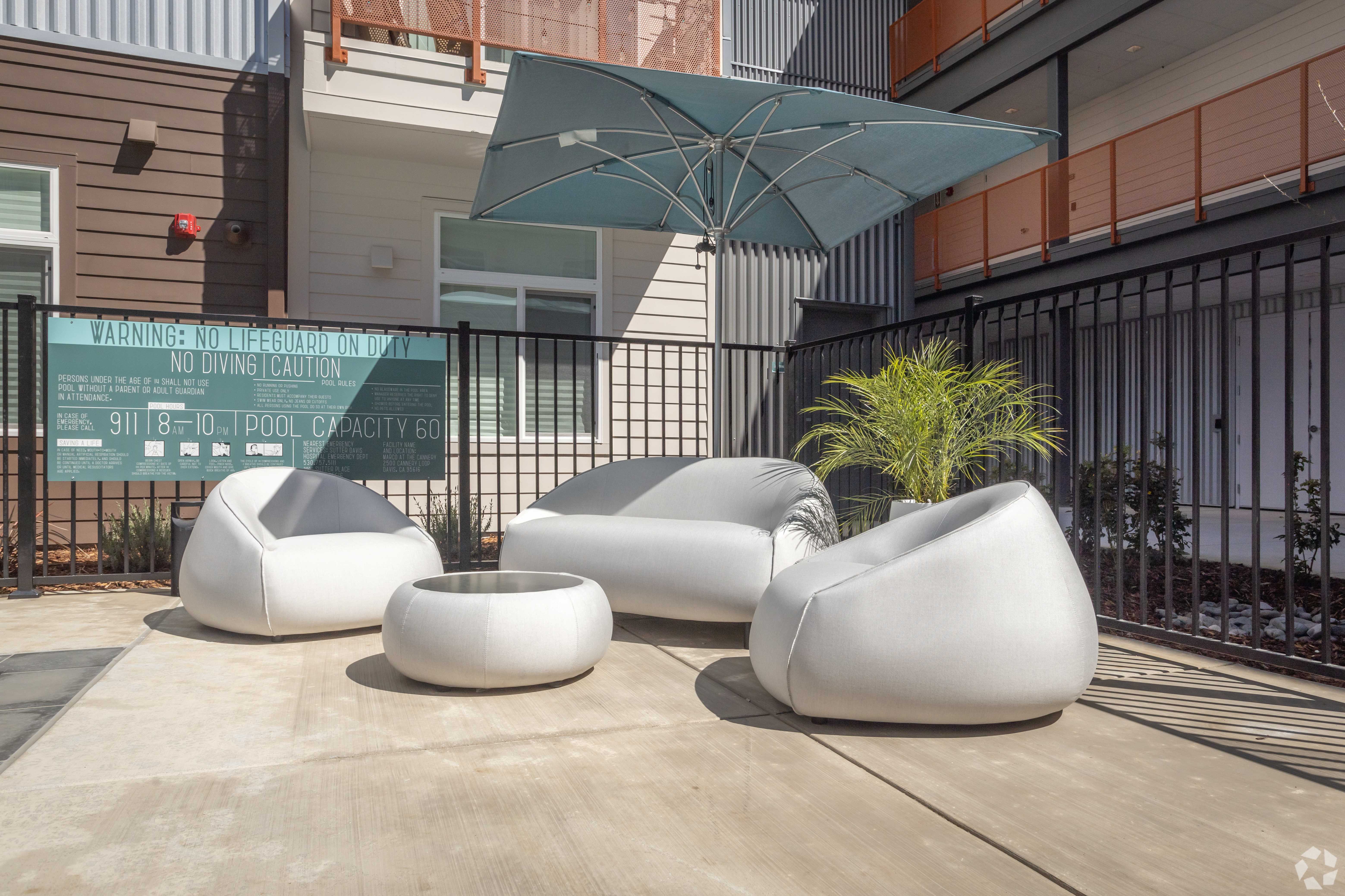 Outdoor living area with modern seating at MarCo at the Cannery in Davis, California