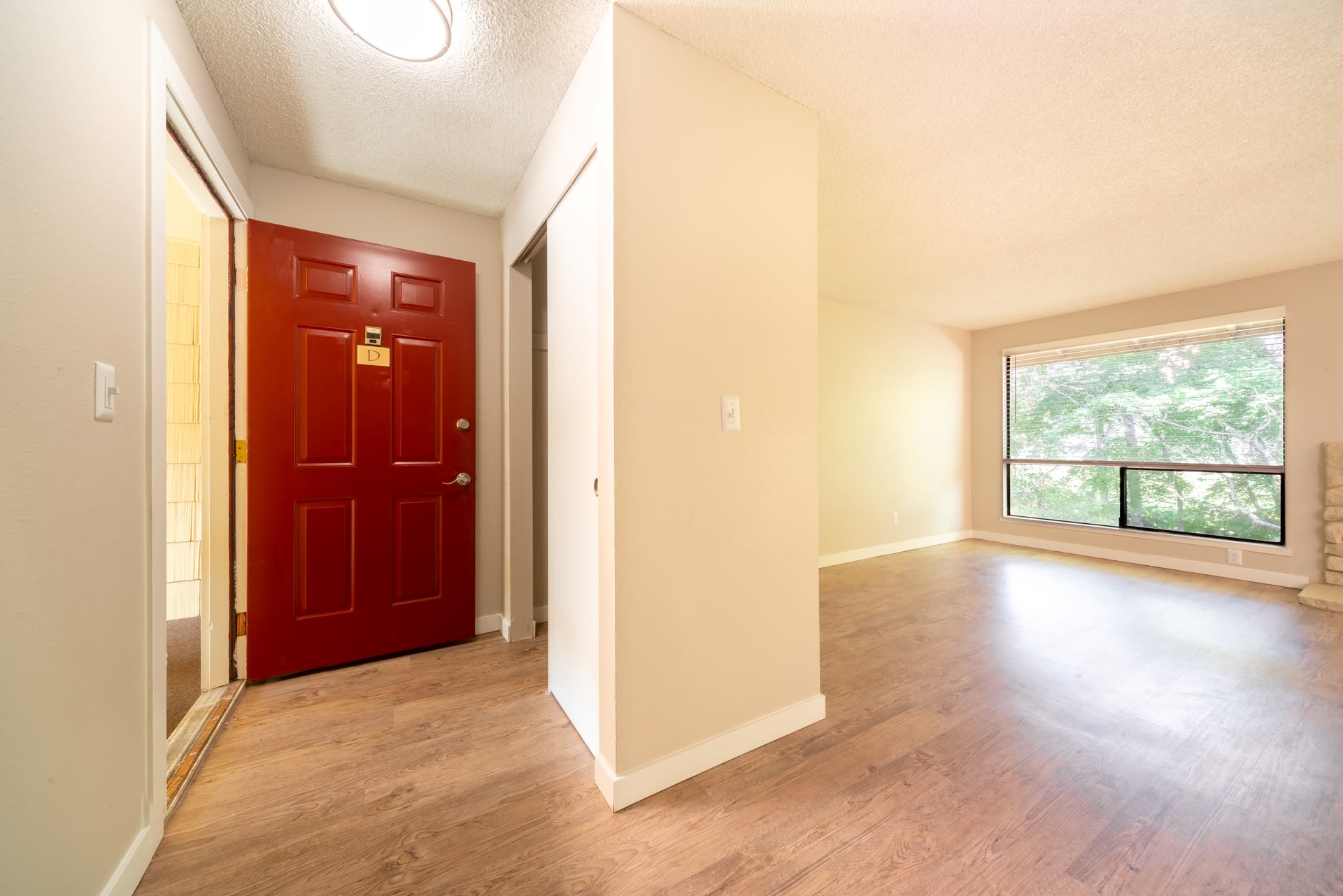 entry and view of living room at The Commons in Federal Way, Washington