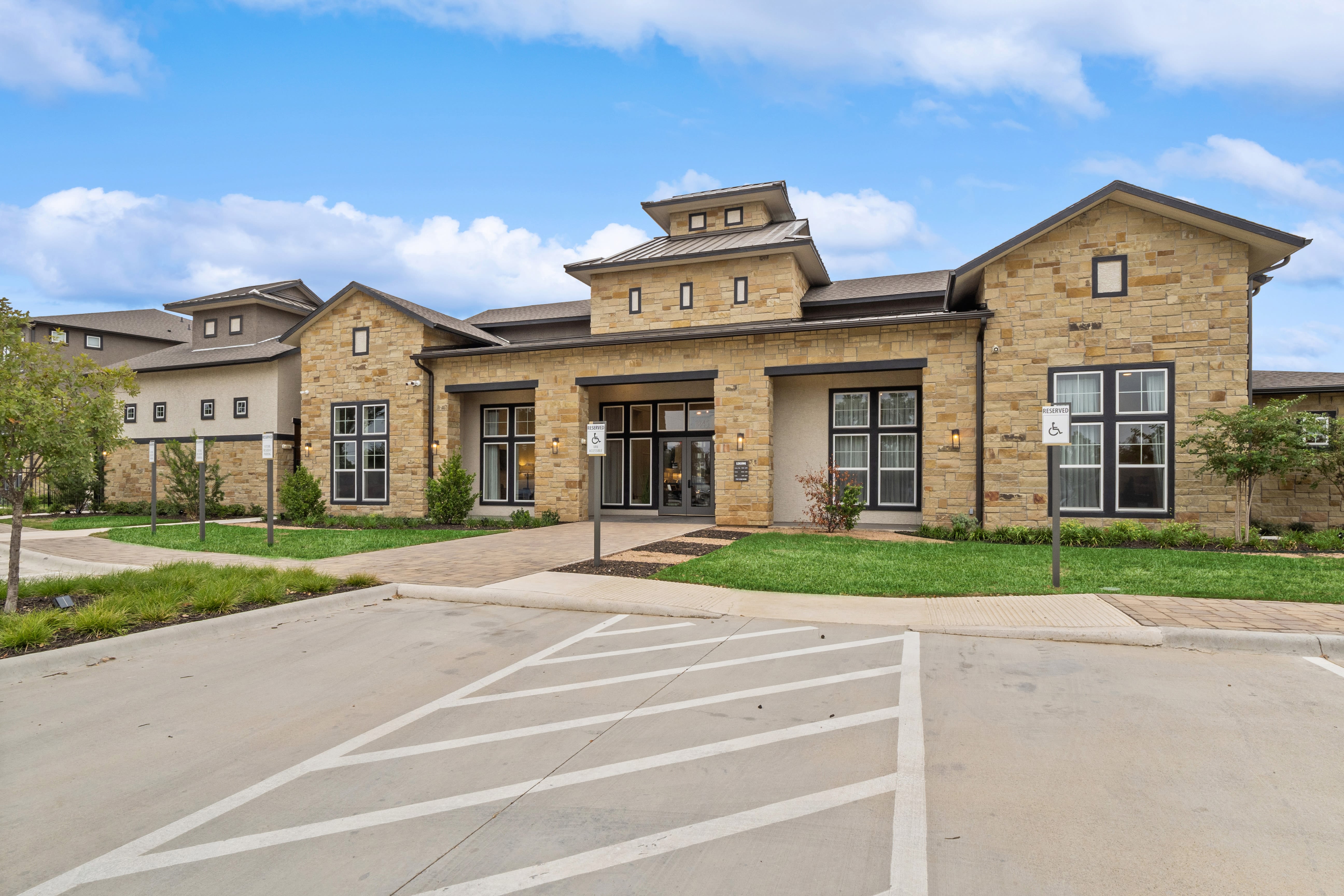 Exterior of the leasing office at Radius Wolf Ranch in Georgetown, Texas