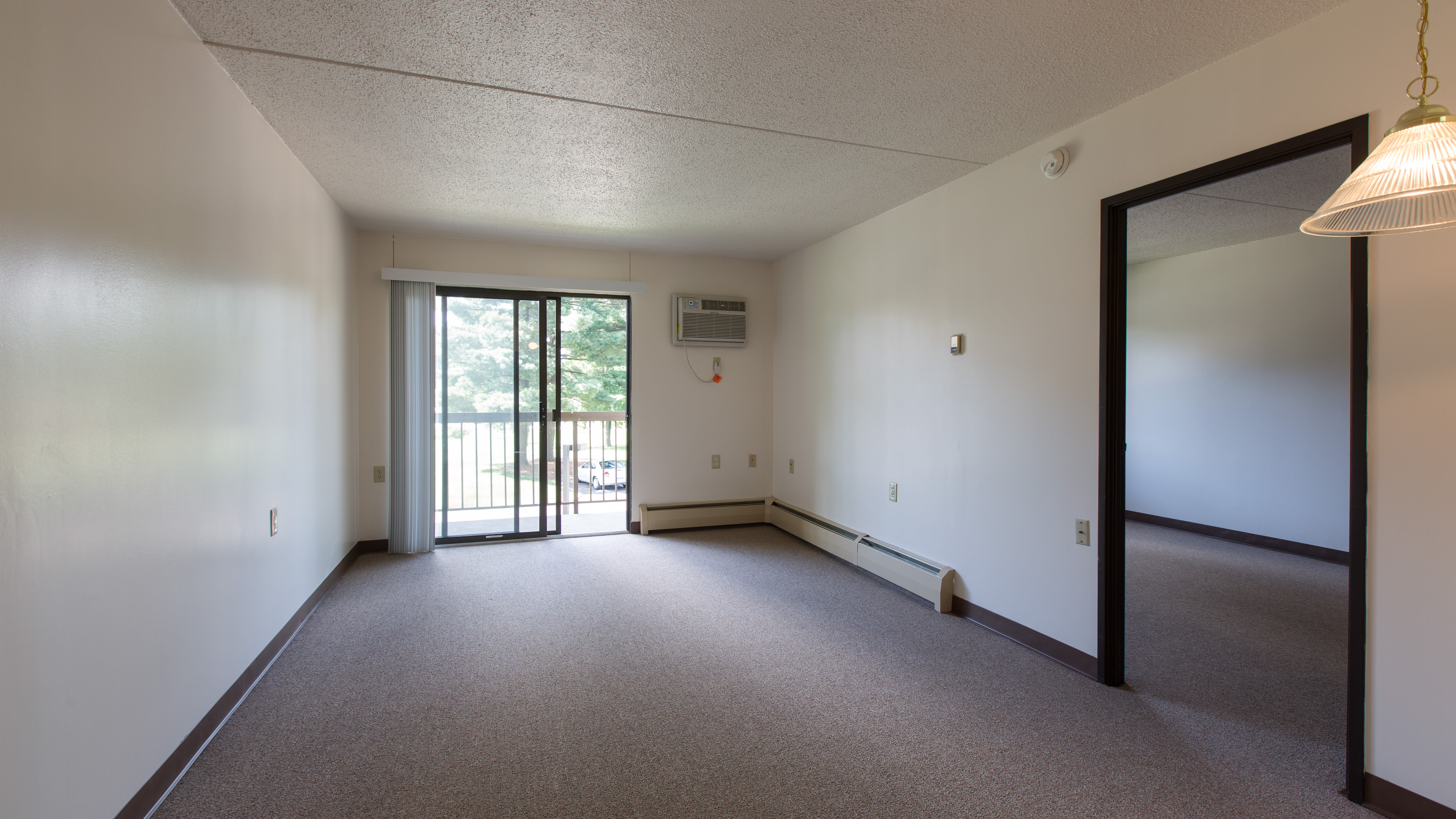 Living room of a model apartment at Ziegler Place in Livonia, Michigan