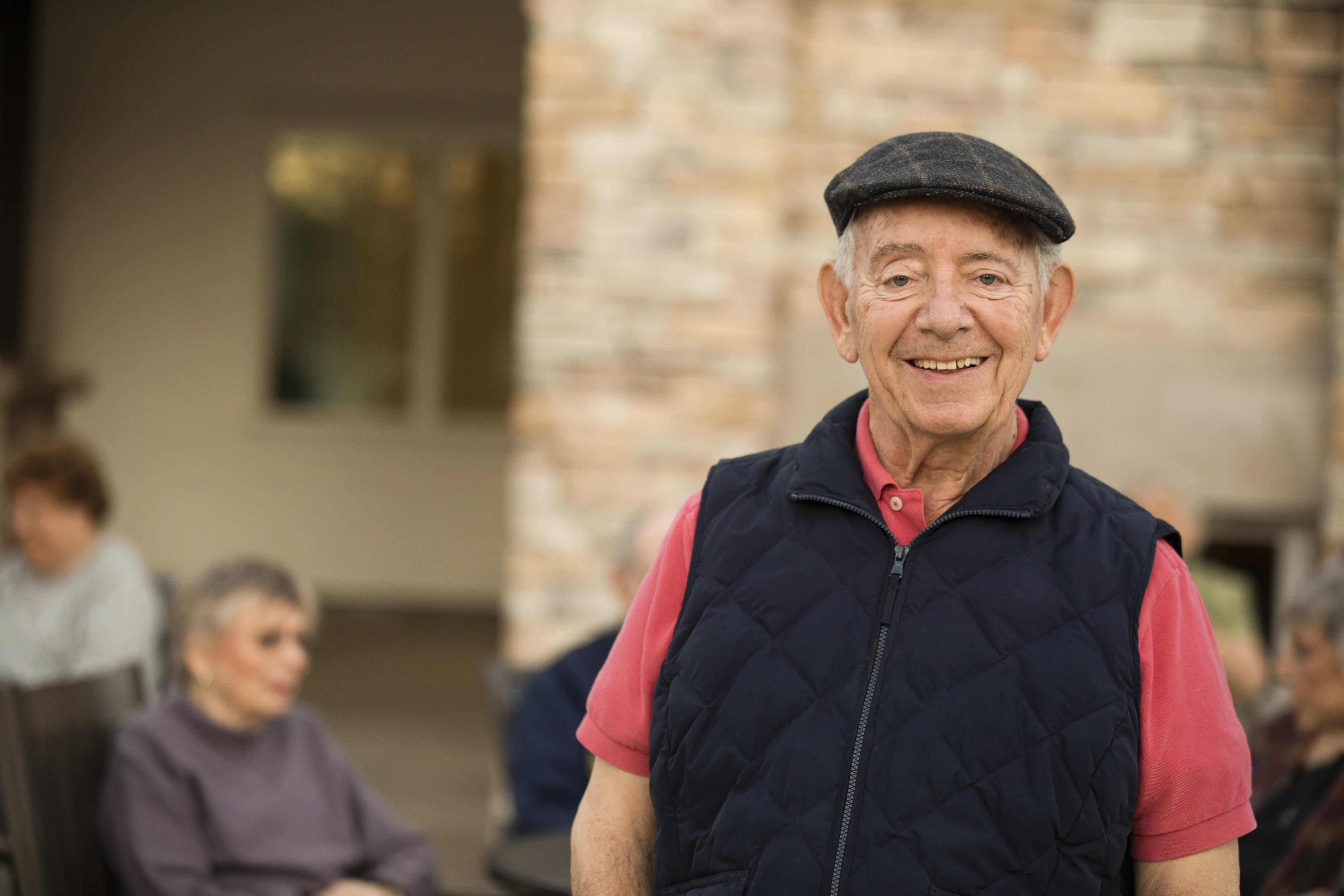 smiling resident outside at Clearwater at The Heights in Houston, Texas