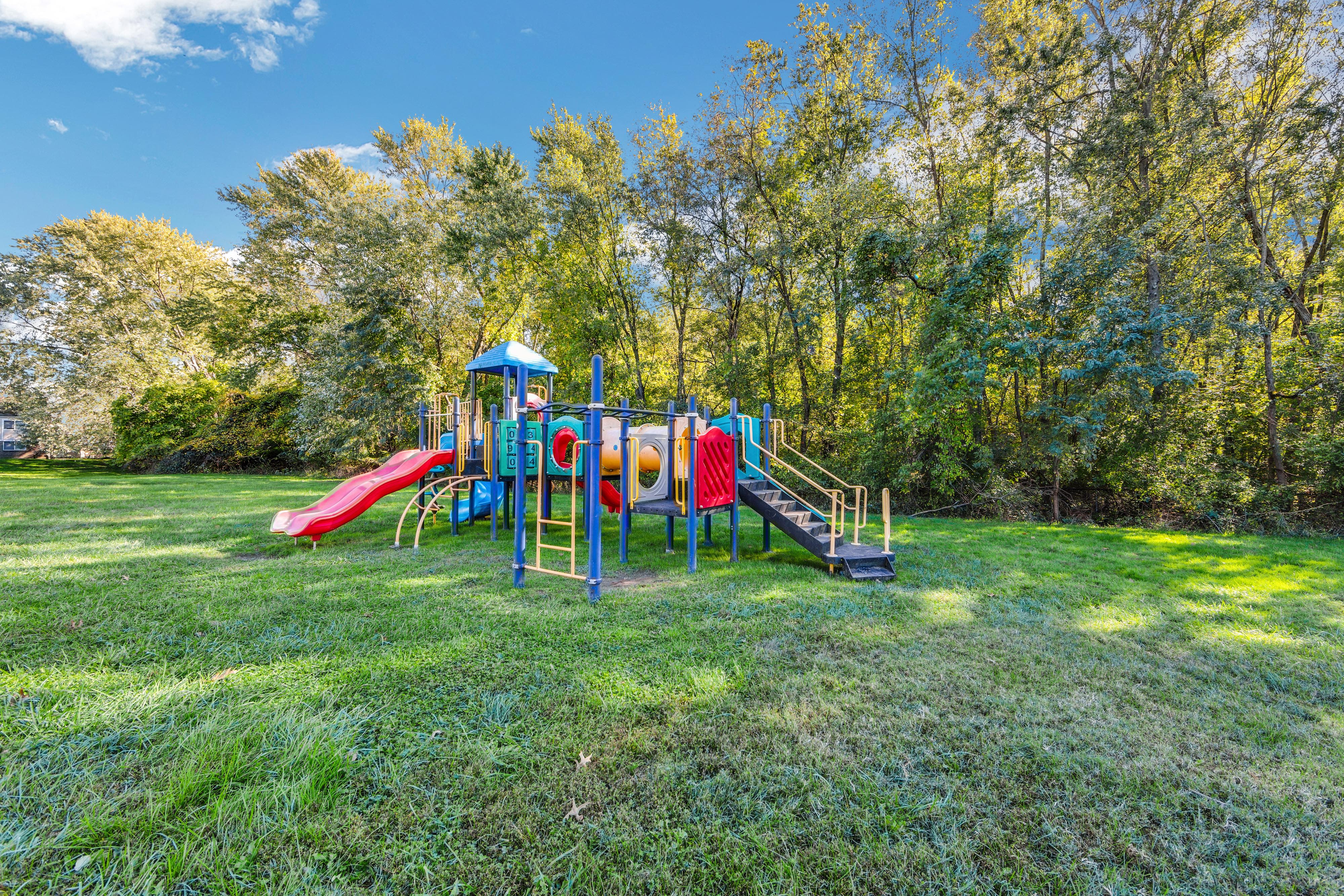 Playground with swings and slides at Blair Mill Village East Apartment Homes, Horsham, Pennsylvania