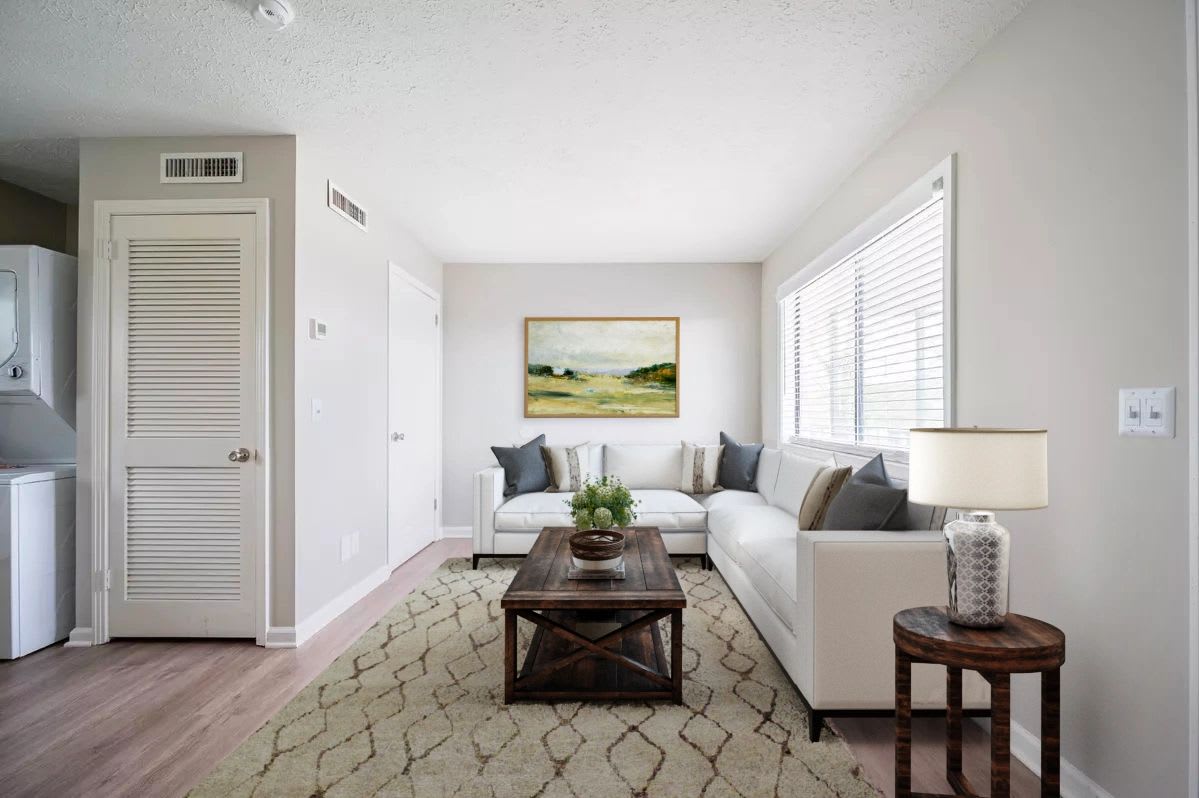 Living room with wallpaper and lamp at Skyline Flats in Nashville, Tennessee