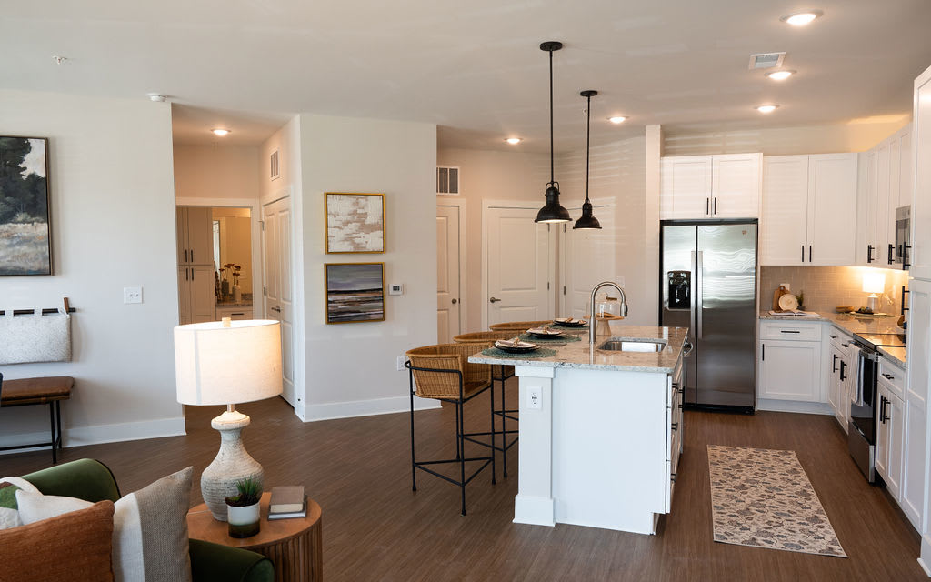 Kitchen with bar stools at Lake Forest at Swift Creek in Midlothian, Virginia