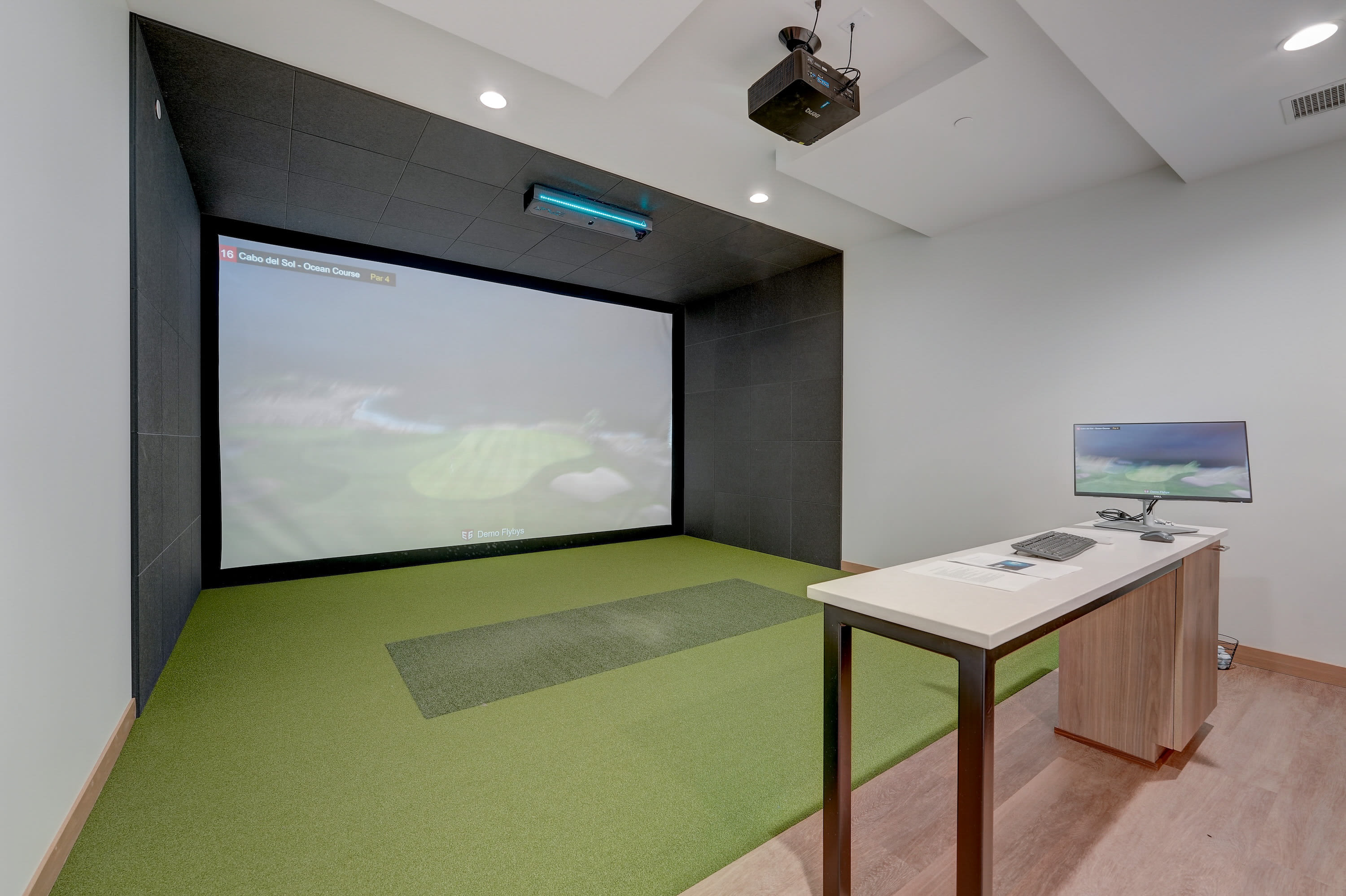 Golf simulator room  at The Eloise at Wirth on the Woods in Minneapolis, Minnesota