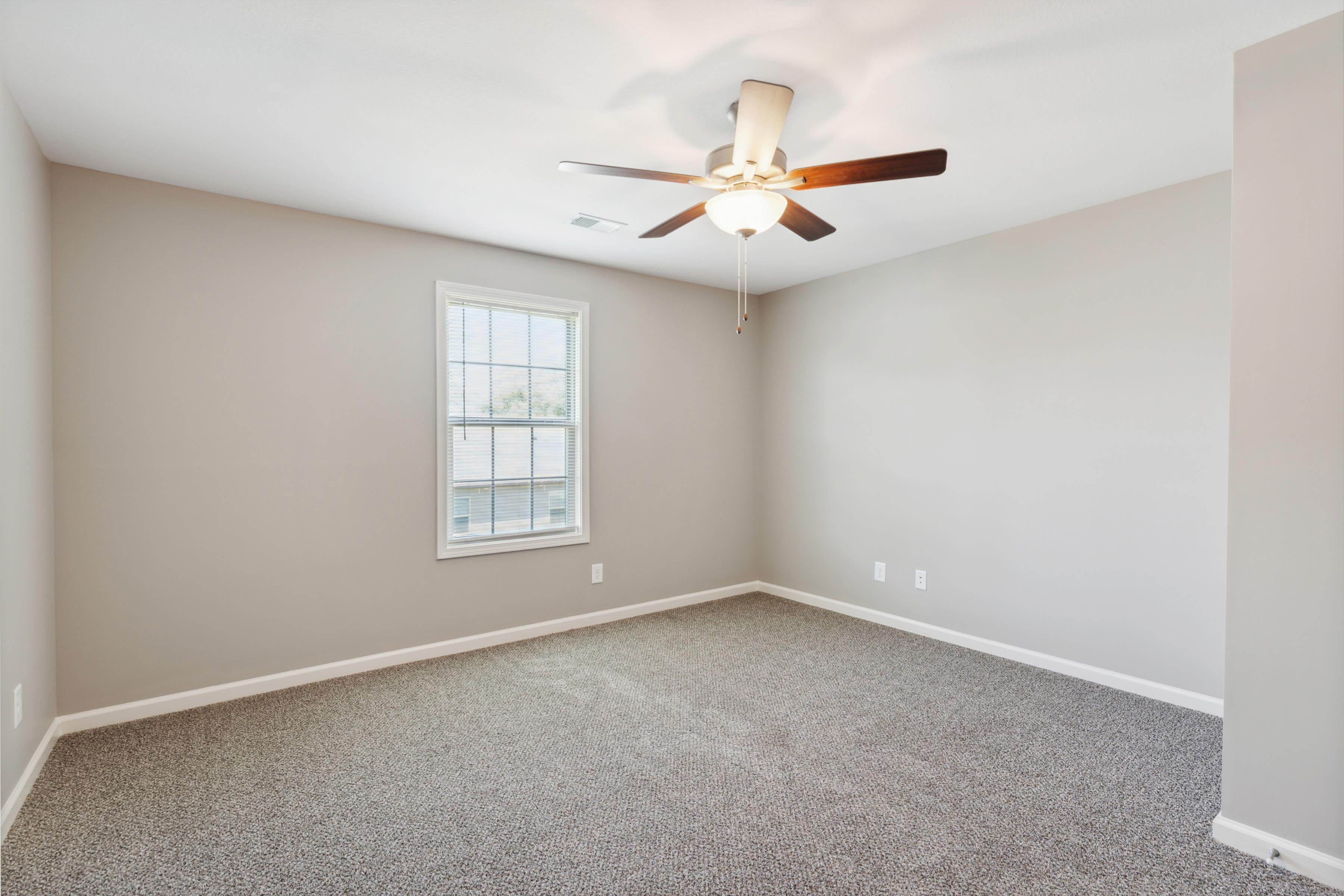 Bedroom with plush carpet at Parkview Place in Clarksville, Tennessee