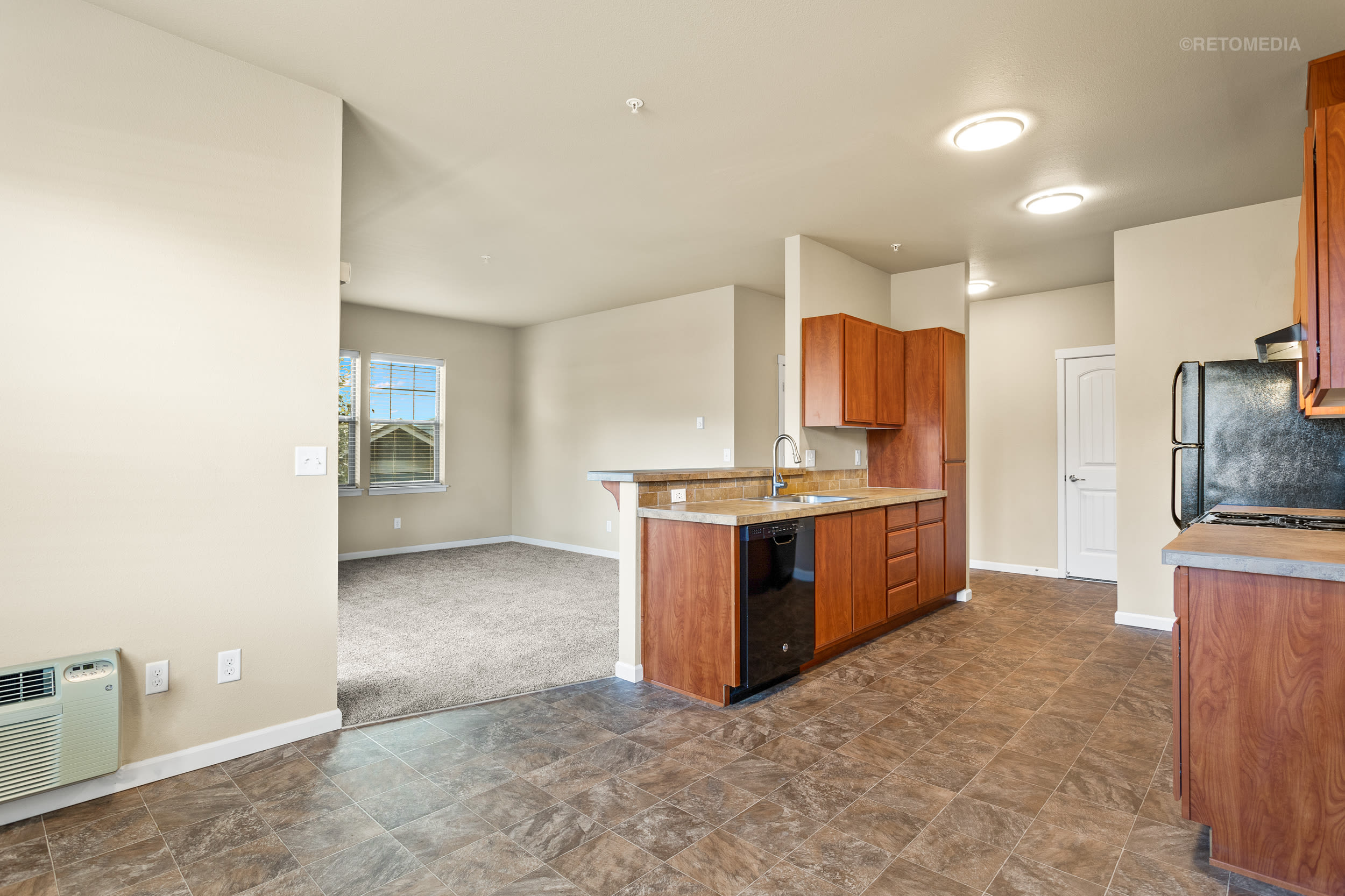 fully equipped kitchen with dining area at Orchard Ridge in Salem, Oregon