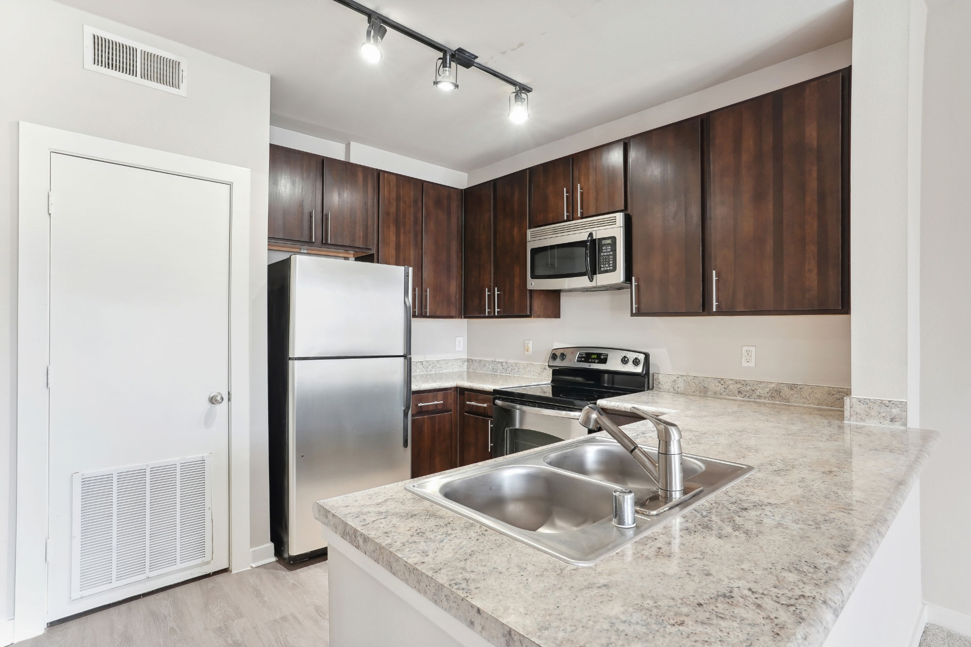 white kitchen at Flatiron District at Austin Ranch in The Colony, Texas