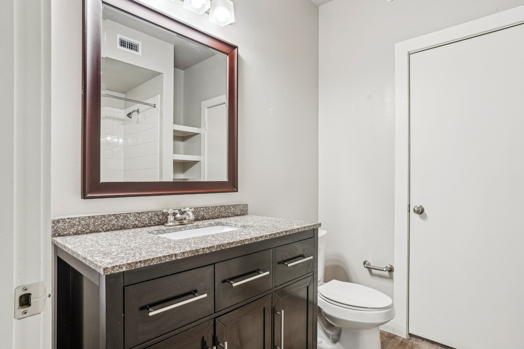 white bathroom at Flatiron District at Austin Ranch in The Colony, Texas