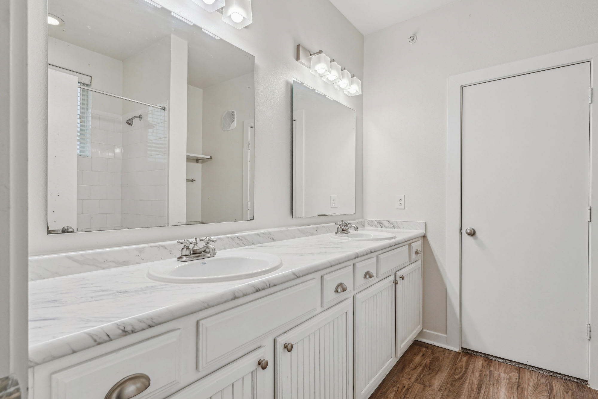 white bathroom at Flatiron District at Austin Ranch in The Colony, Texas