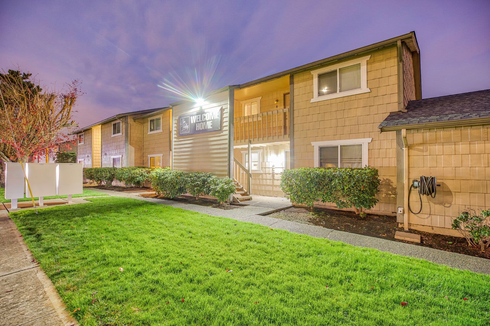 Night view of an apartment at Elm Valley Apartments in Sumner, Washington