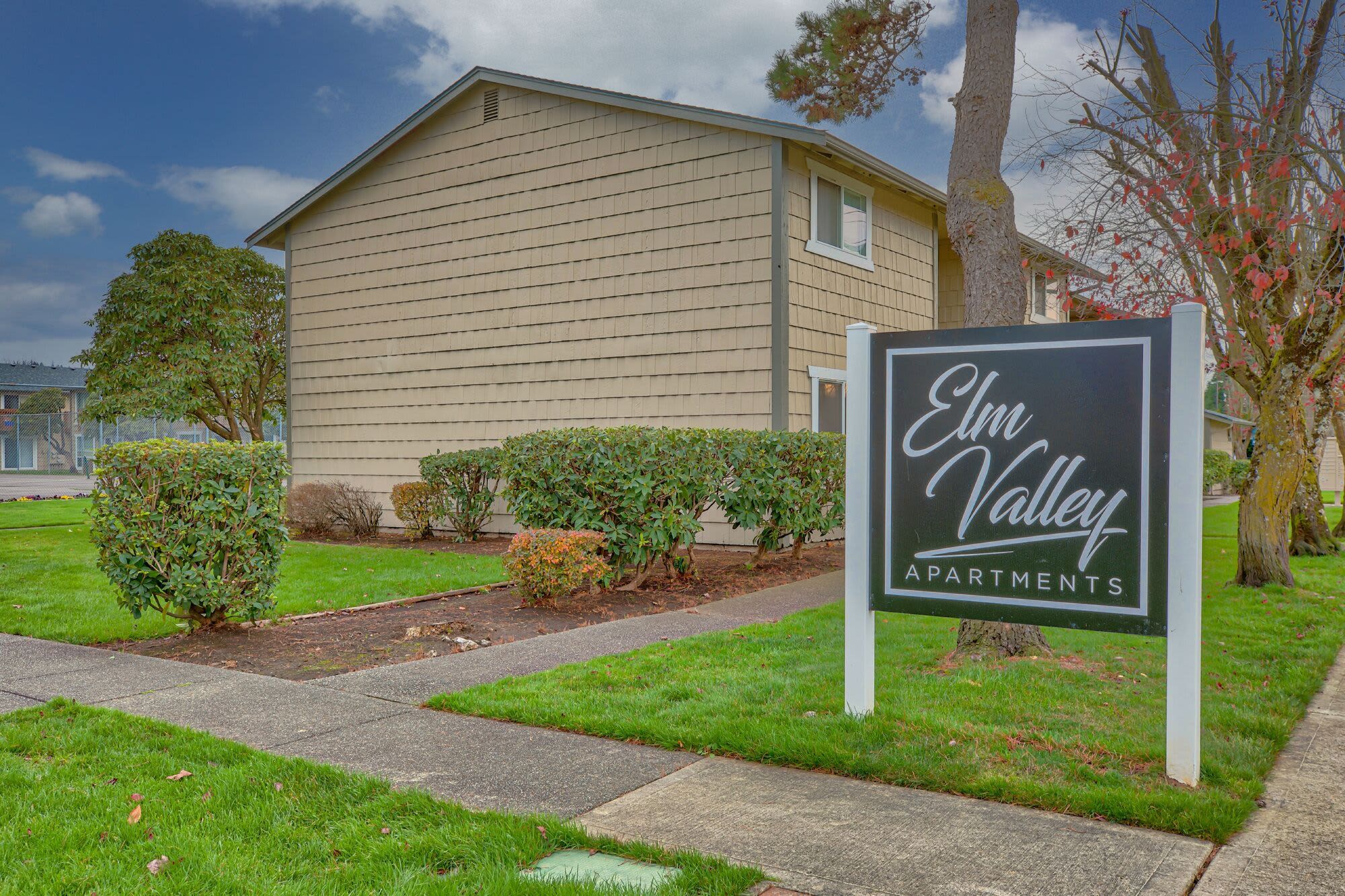 Outside signage at Elm Valley Apartments in Sumner, Washington