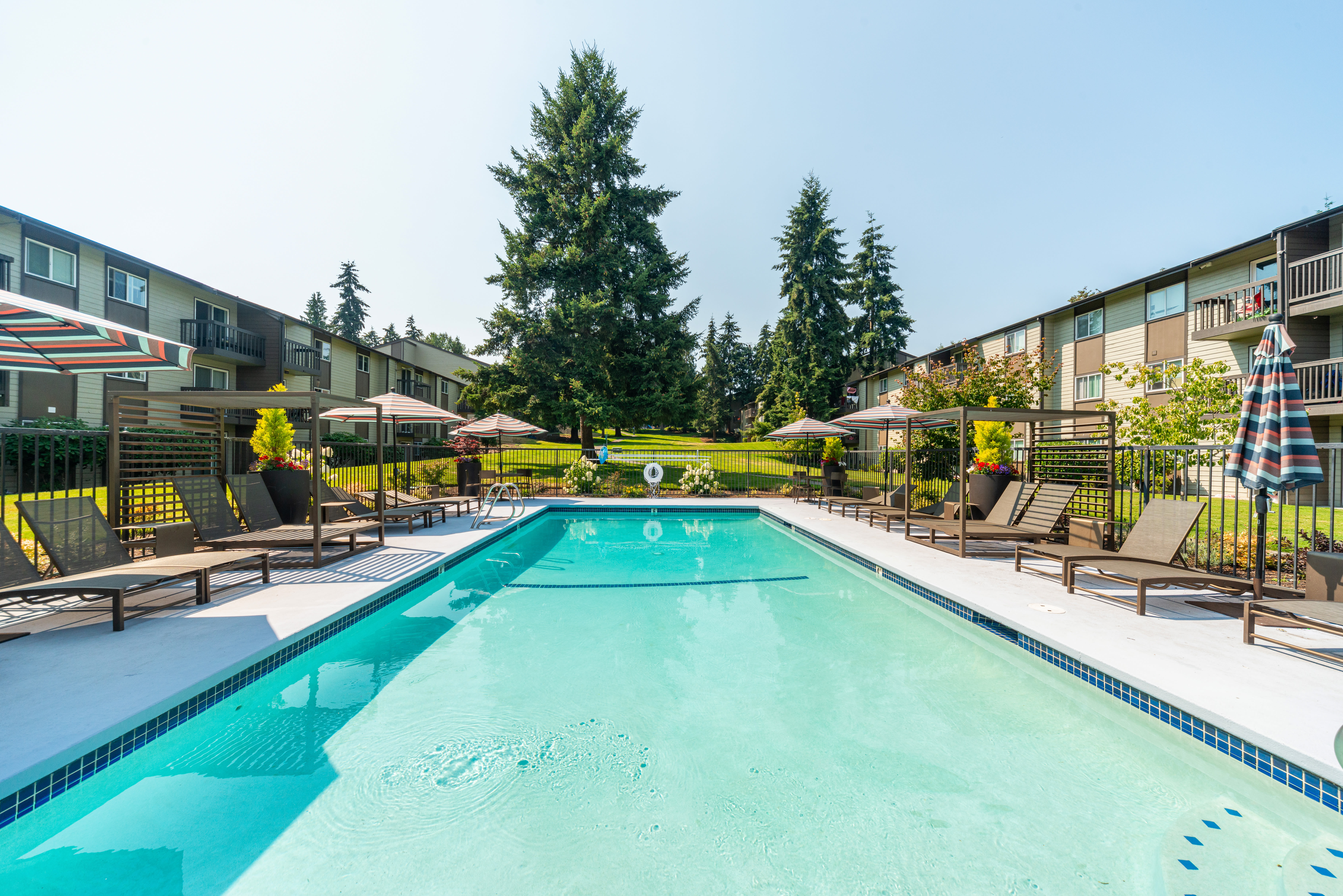 Residents cooking together at home at Terra Apartment Homes in Federal Way, Washington