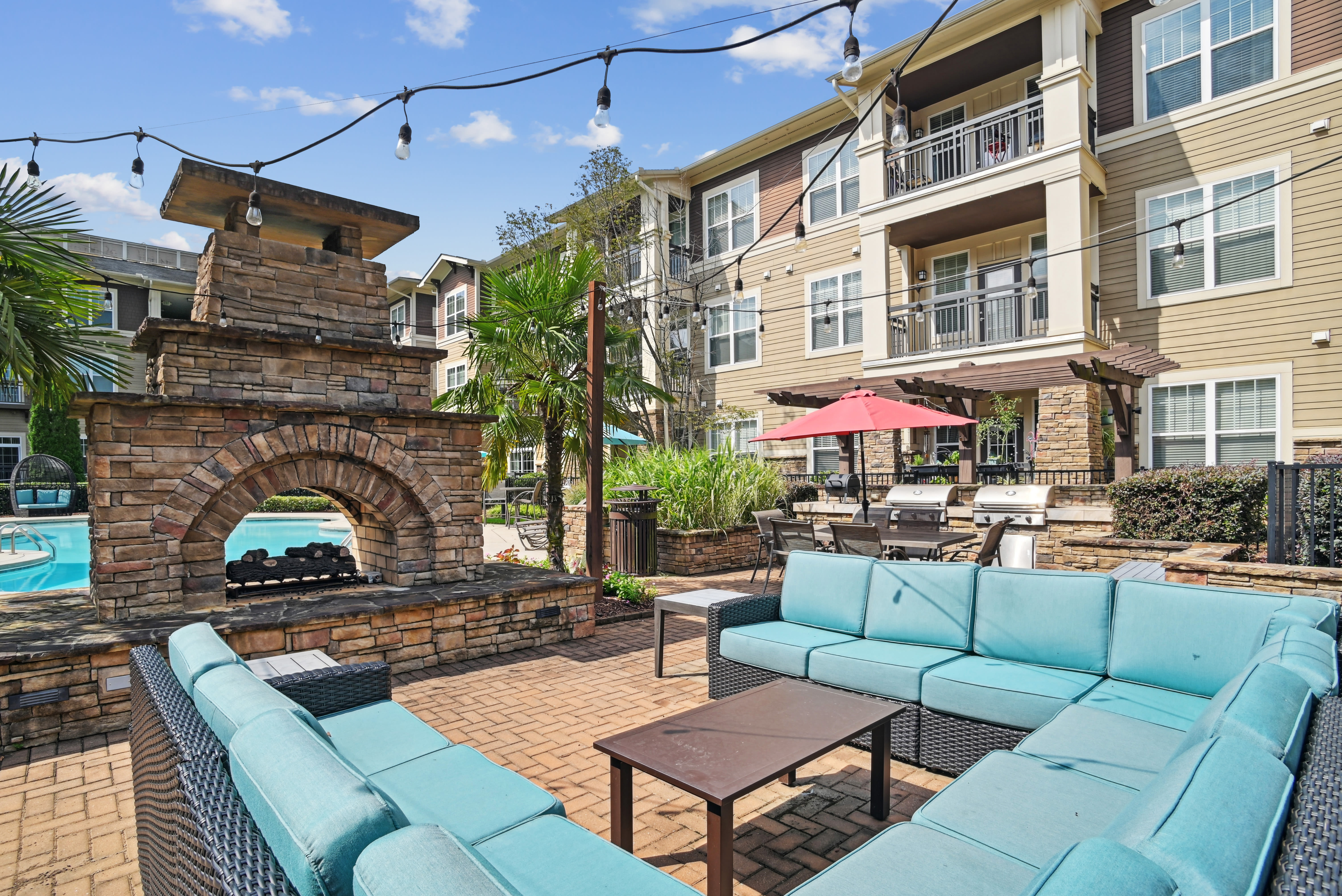 Lounge and socialize in our outdoor patio at Fountains at Mooresville Town Square in Mooresville, North Carolina