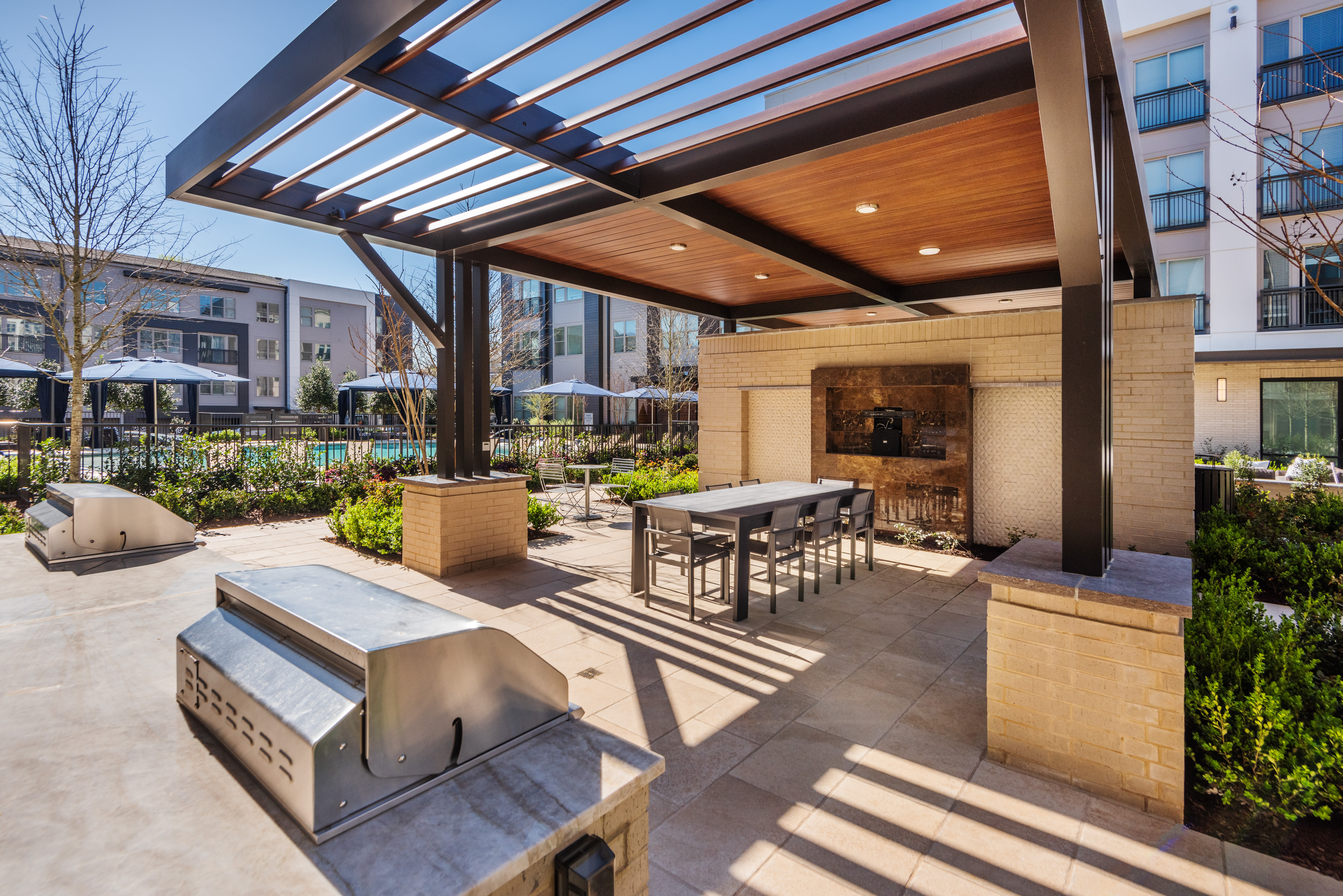 Outdoor community barbecue grills at The Reverie At Lake Boone in Raleigh, North Carolina