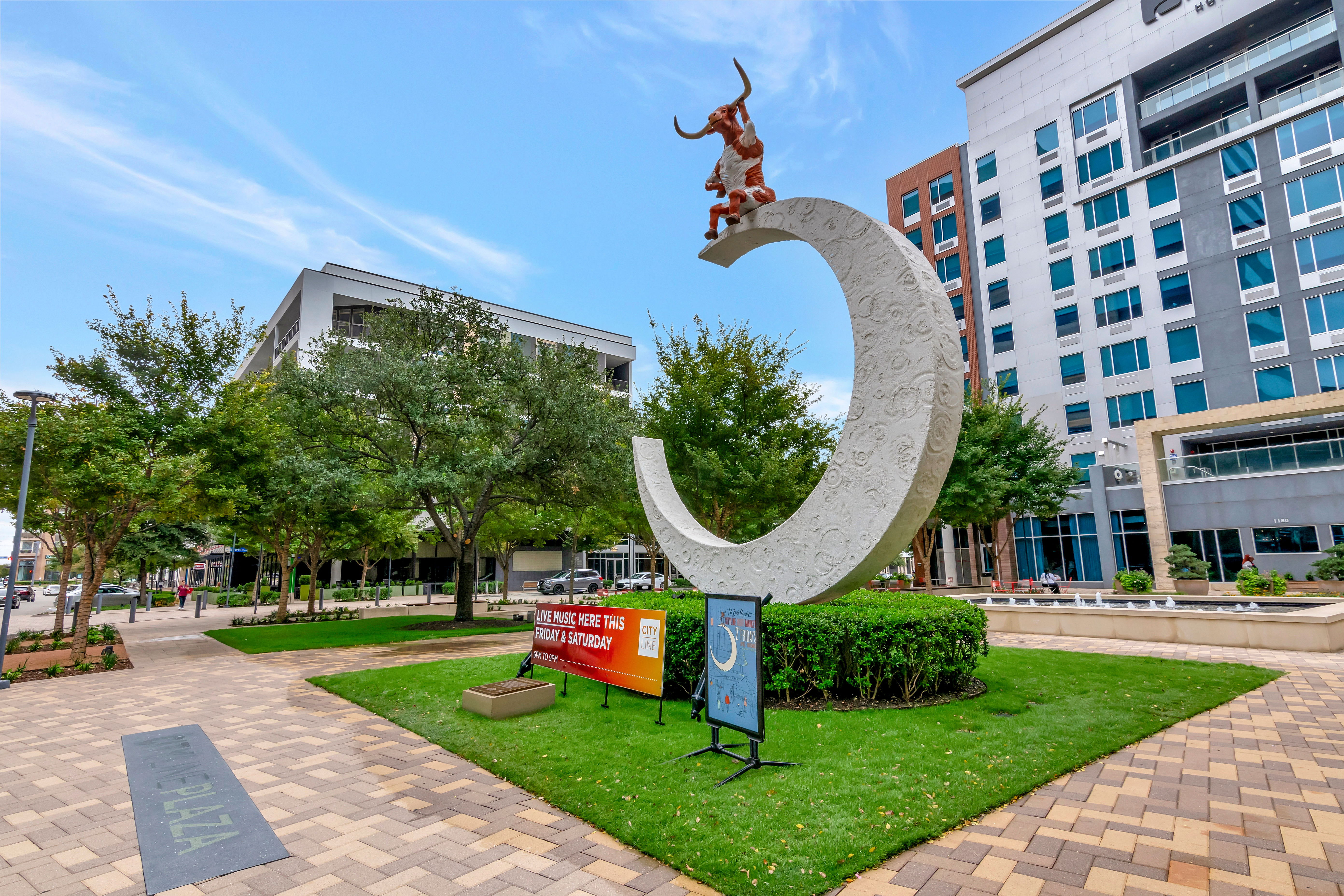 A resident playing with her dog at Anthem Cityline in Richardson, Texas